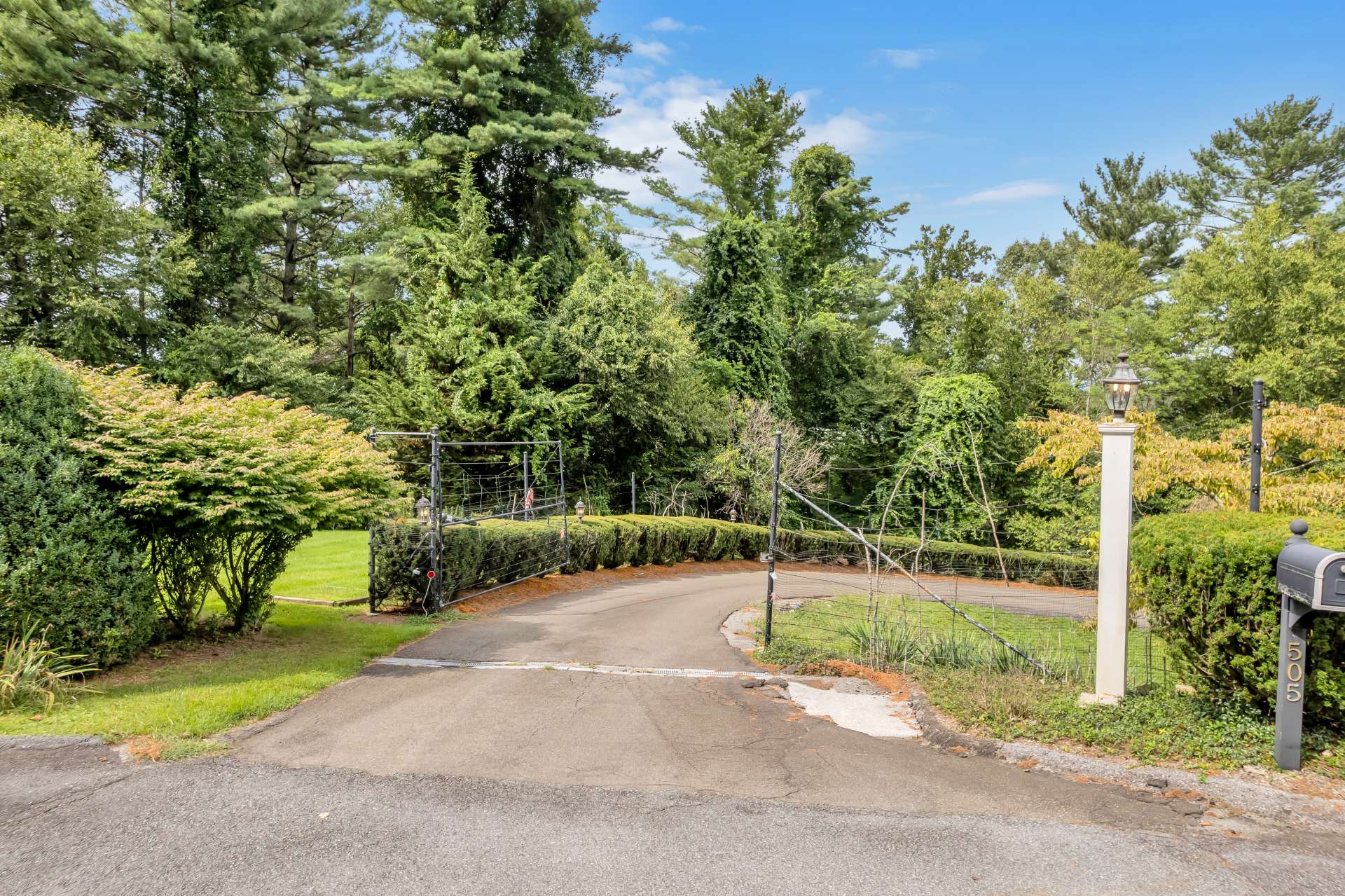 Located at the end of the cul-de-sac for added privacy, a gated entrance and private paved driveway welcomes you home.
