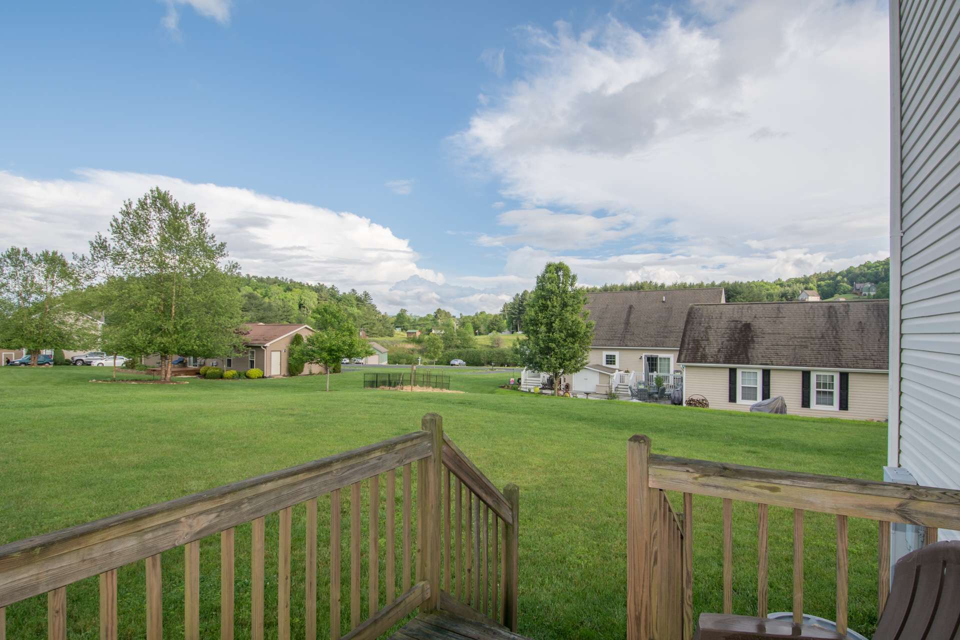 The back yard offers plenty of room for play and landscaping projects.