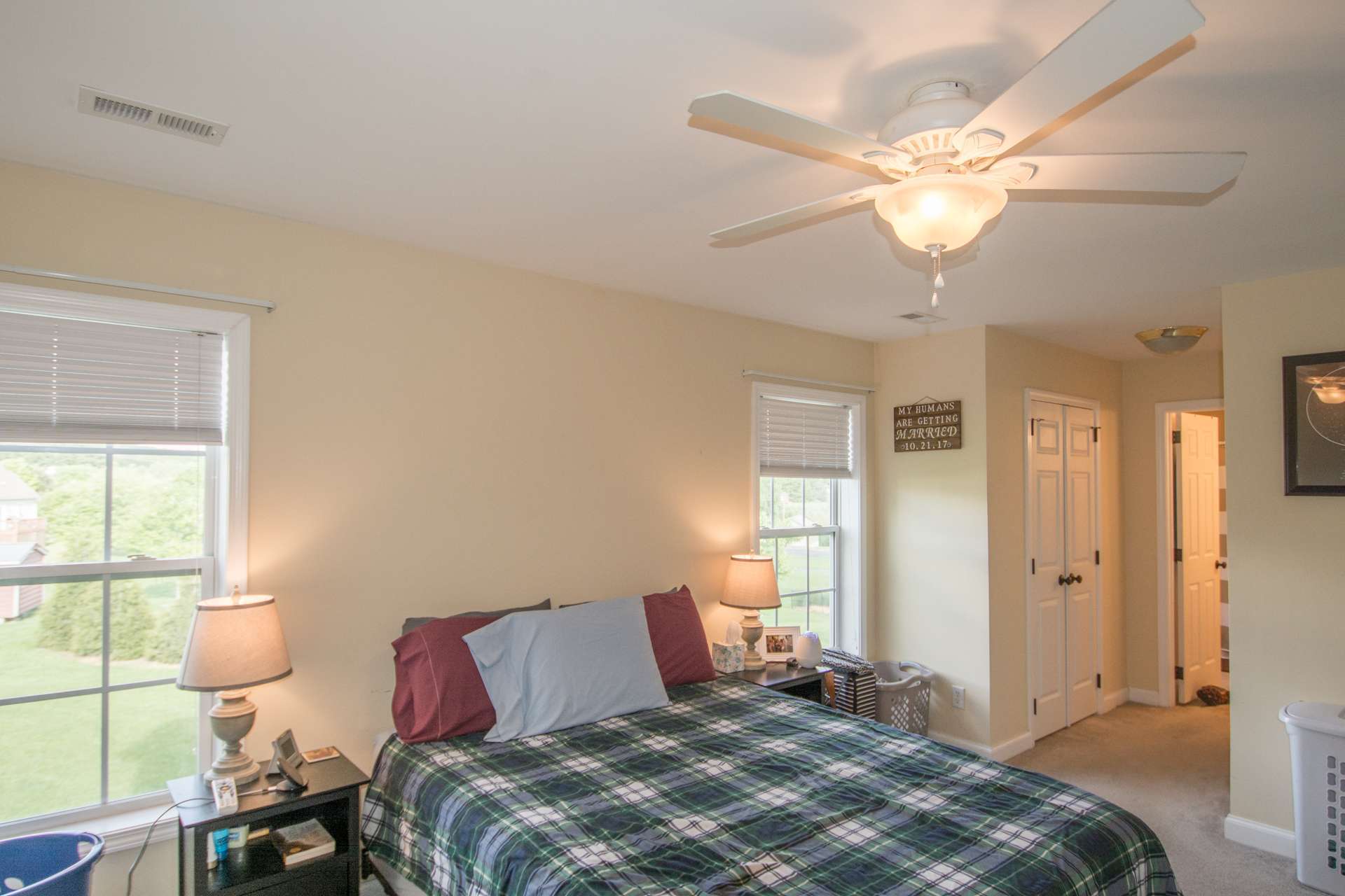 The master suite is located on the upper level and offers double closets and a private bath with double vanity.