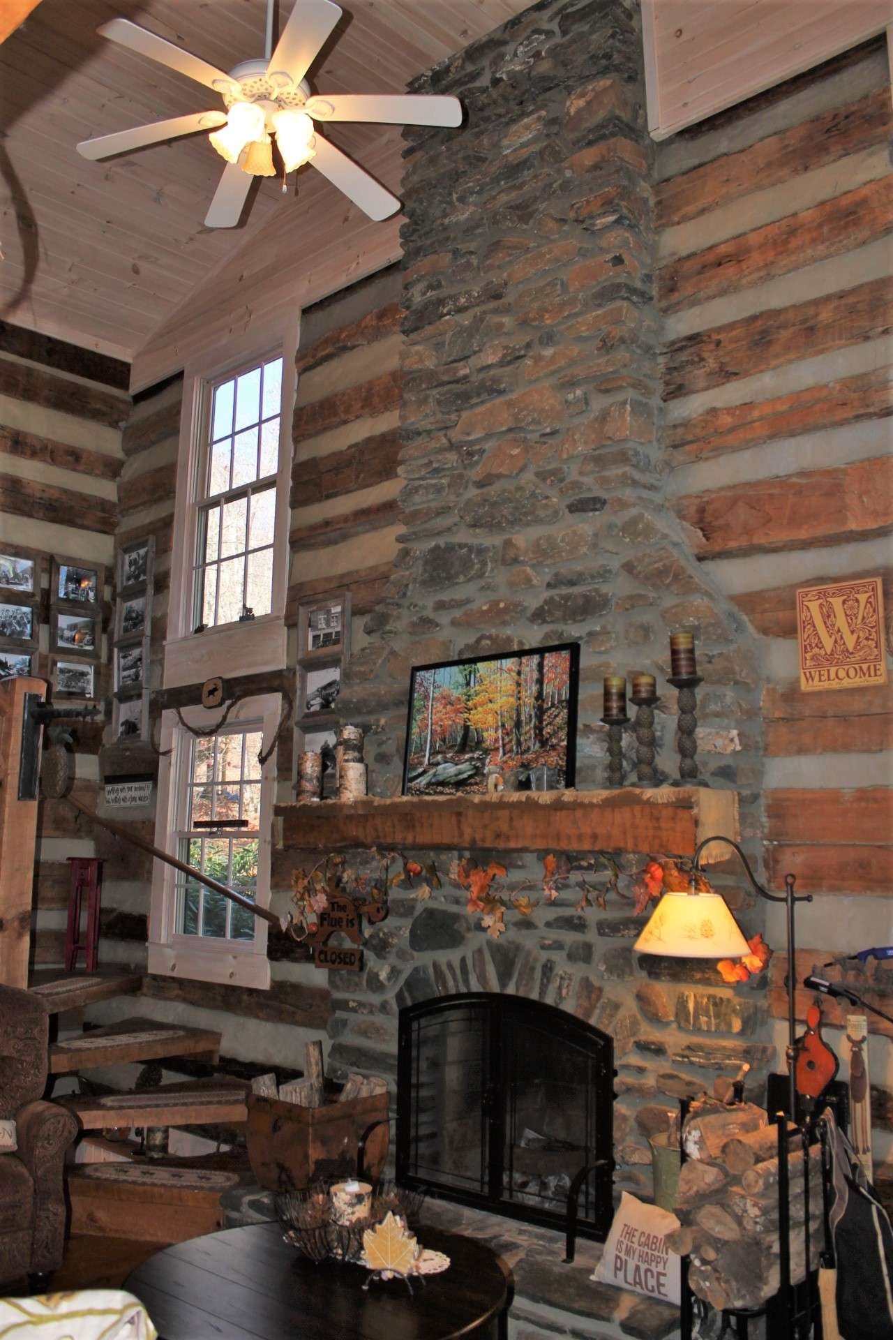 The native stone wood burning fireplace soars to the cathedral ceiling. It has been said that in the old log homes of yesteryear, the hearth was the heart of the home. On a winter's day while relaxing and listening to the crackling fire, we are convinced that is still true today.