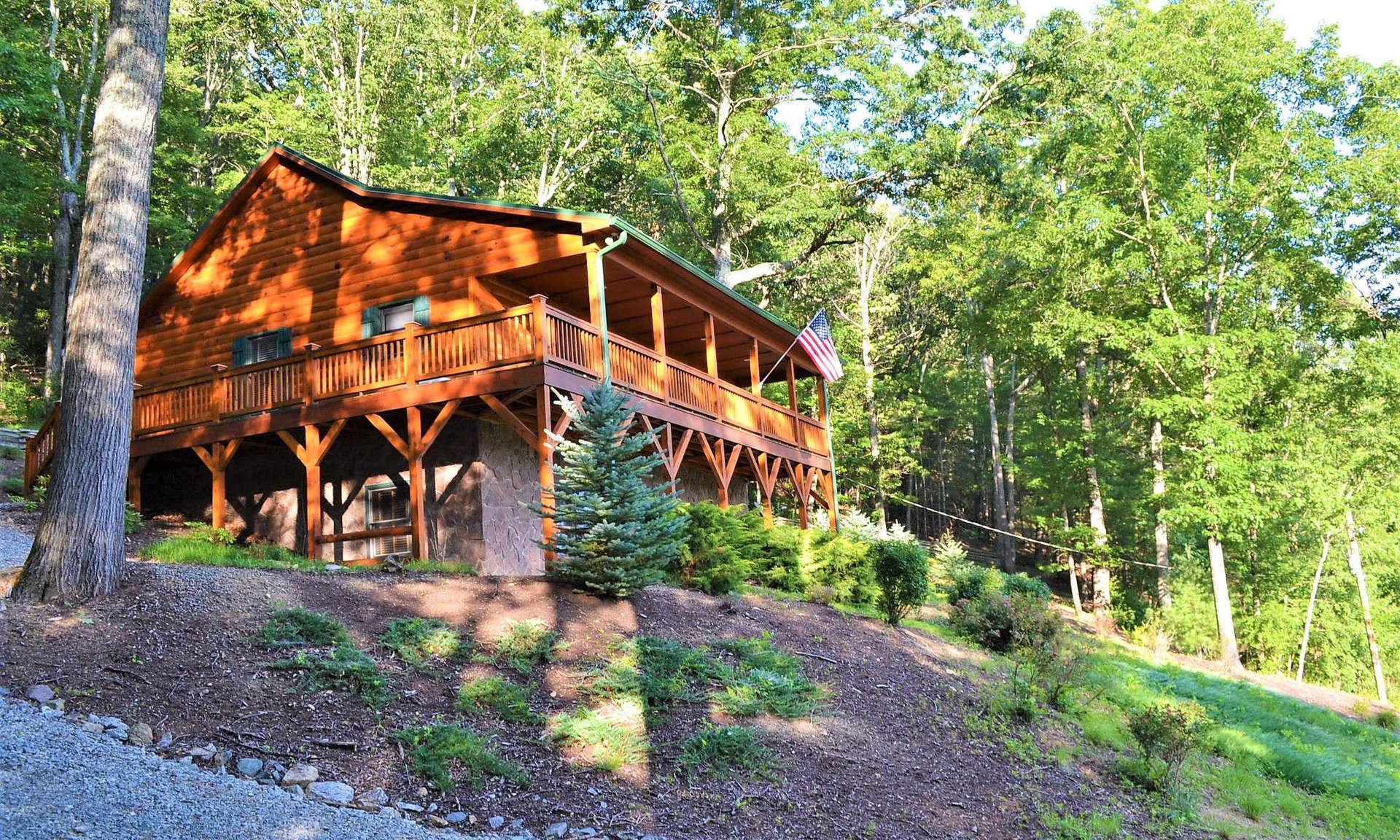 Enjoy the beauty of country farmland and the Virginia mountains beyond from the front porch of this immaculate quality built custom 2-bedroom, 2-bath Western Red Cedar cabin located in the beautiful Elk Creek Valley area of Grayson County, Southwestern VA.