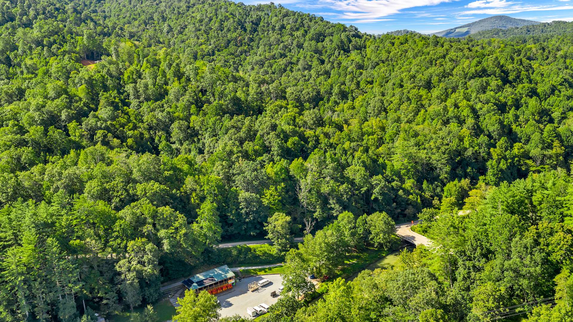 An aerial view from the river toward your property