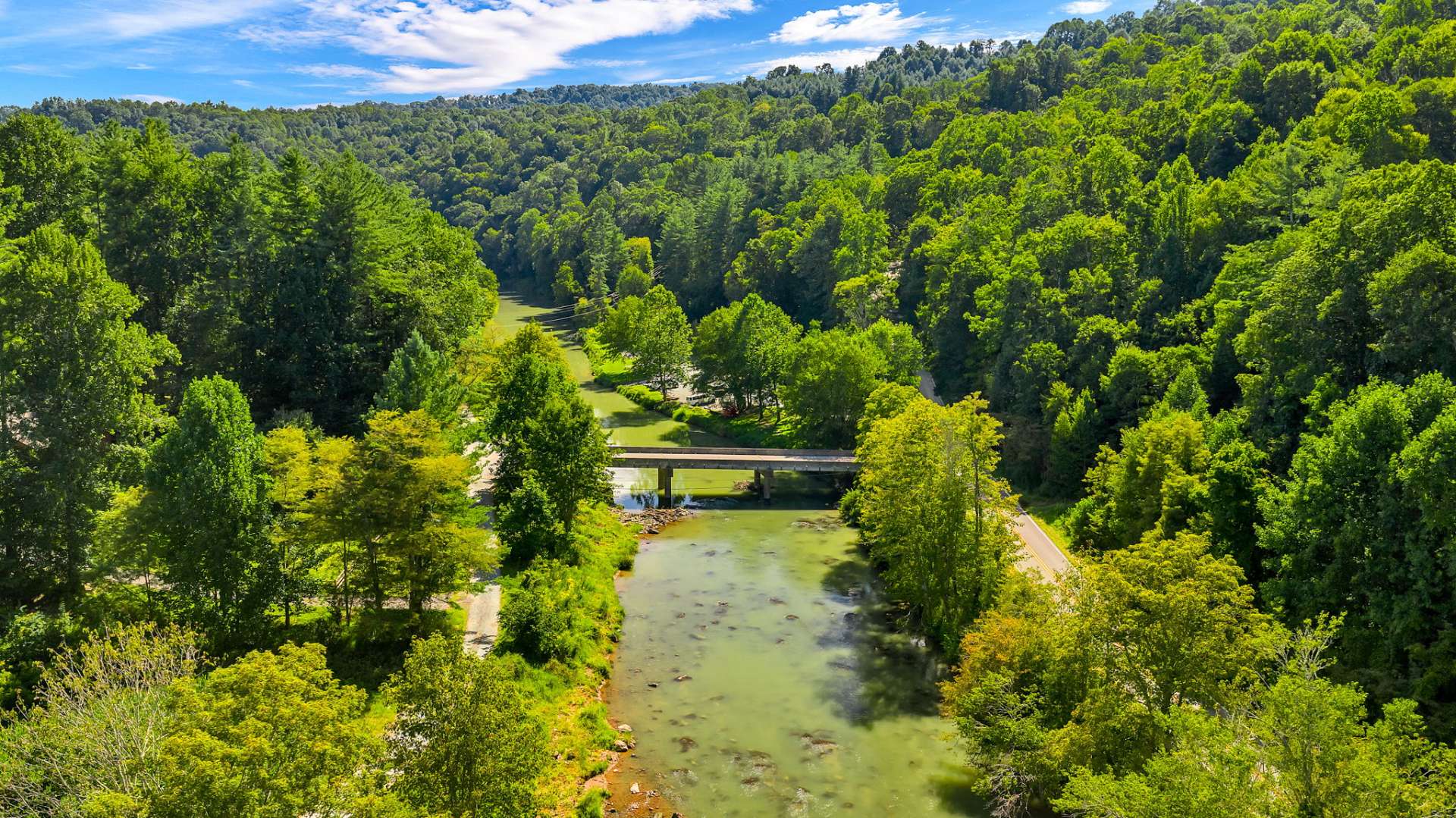 Another aerial of your property just across the bridge, in proximity to the river