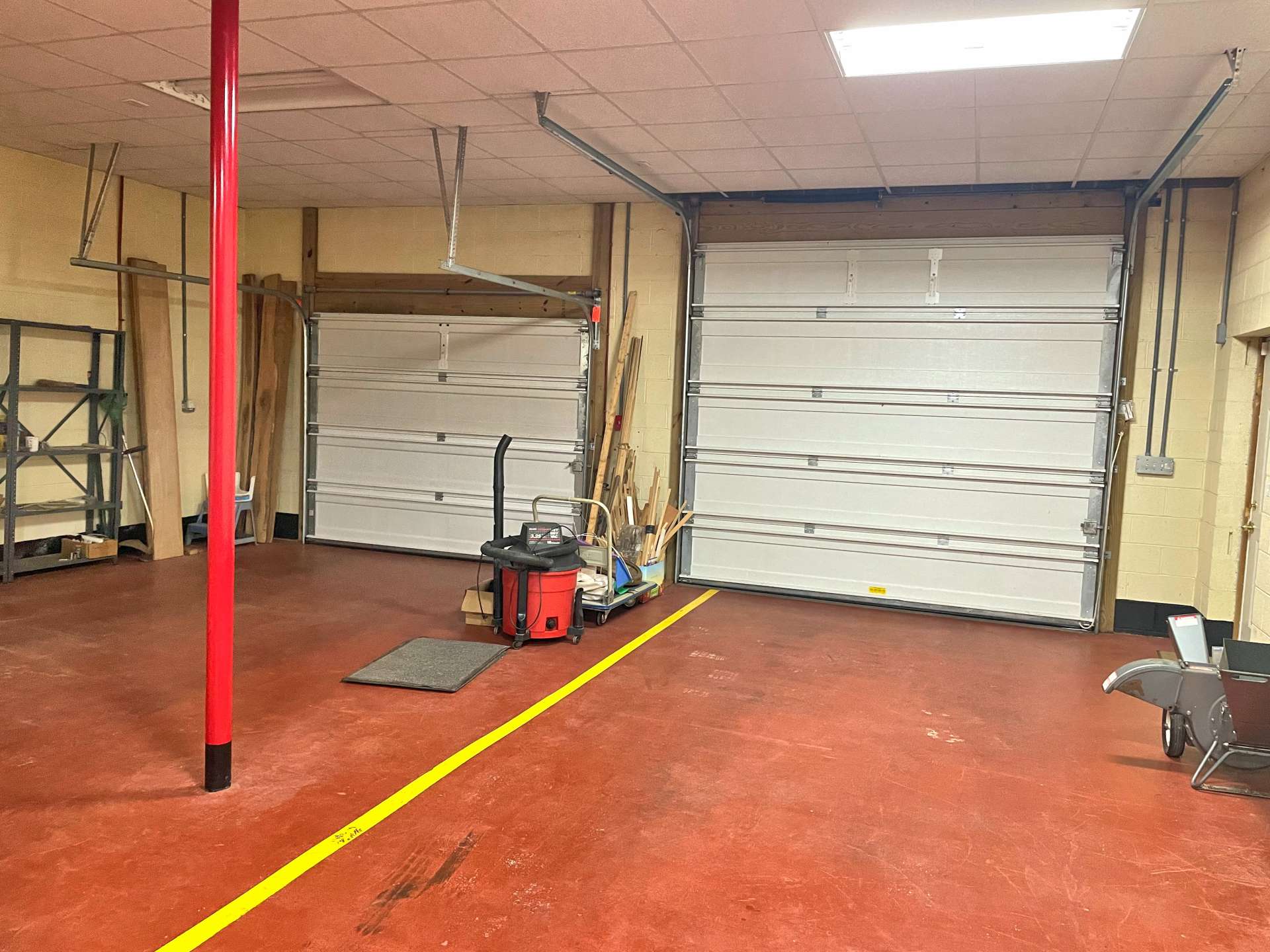 7ft and 9ft garage doors to the basement with 10 ft. ceilings.