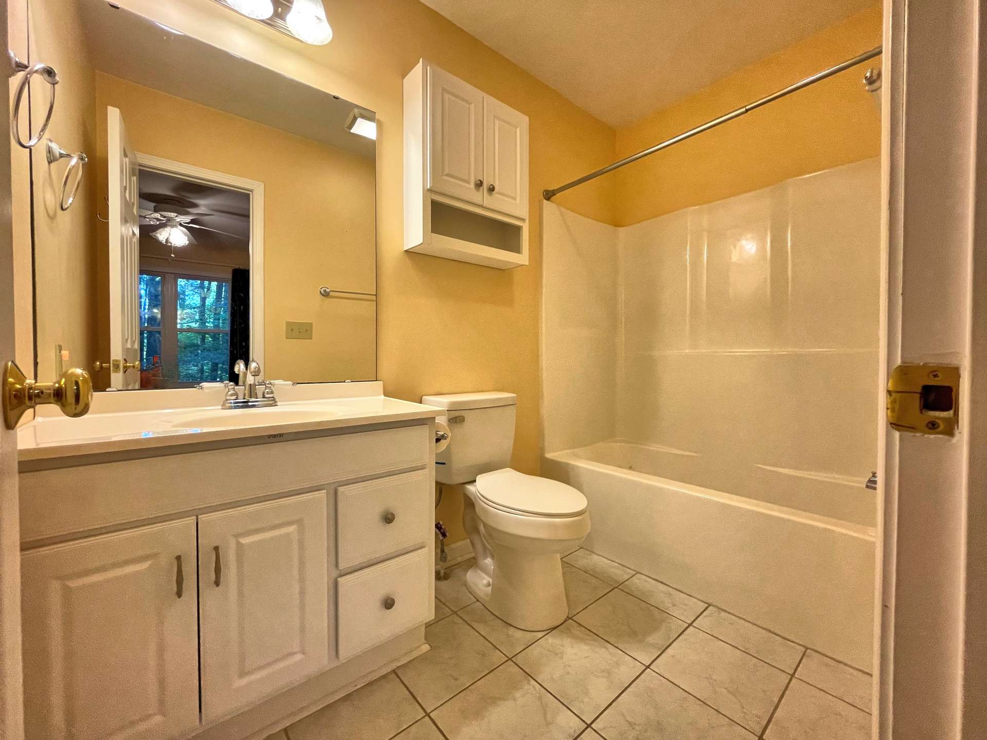 Bath off the primary bedroom at the back of the house.