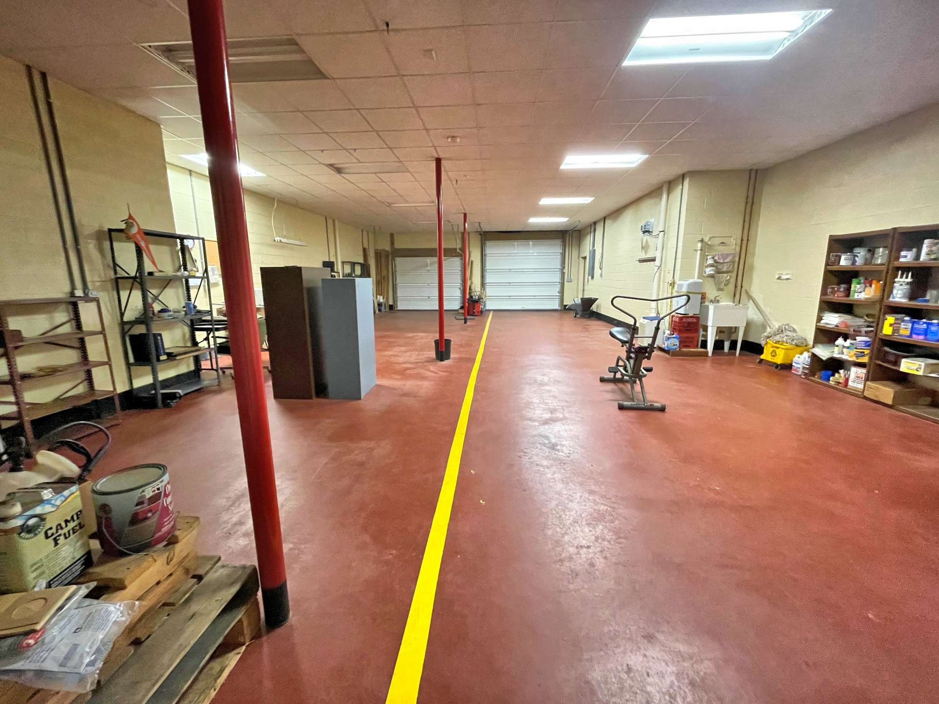 Basement large enough for multiple vehicles and a workshop or storage.