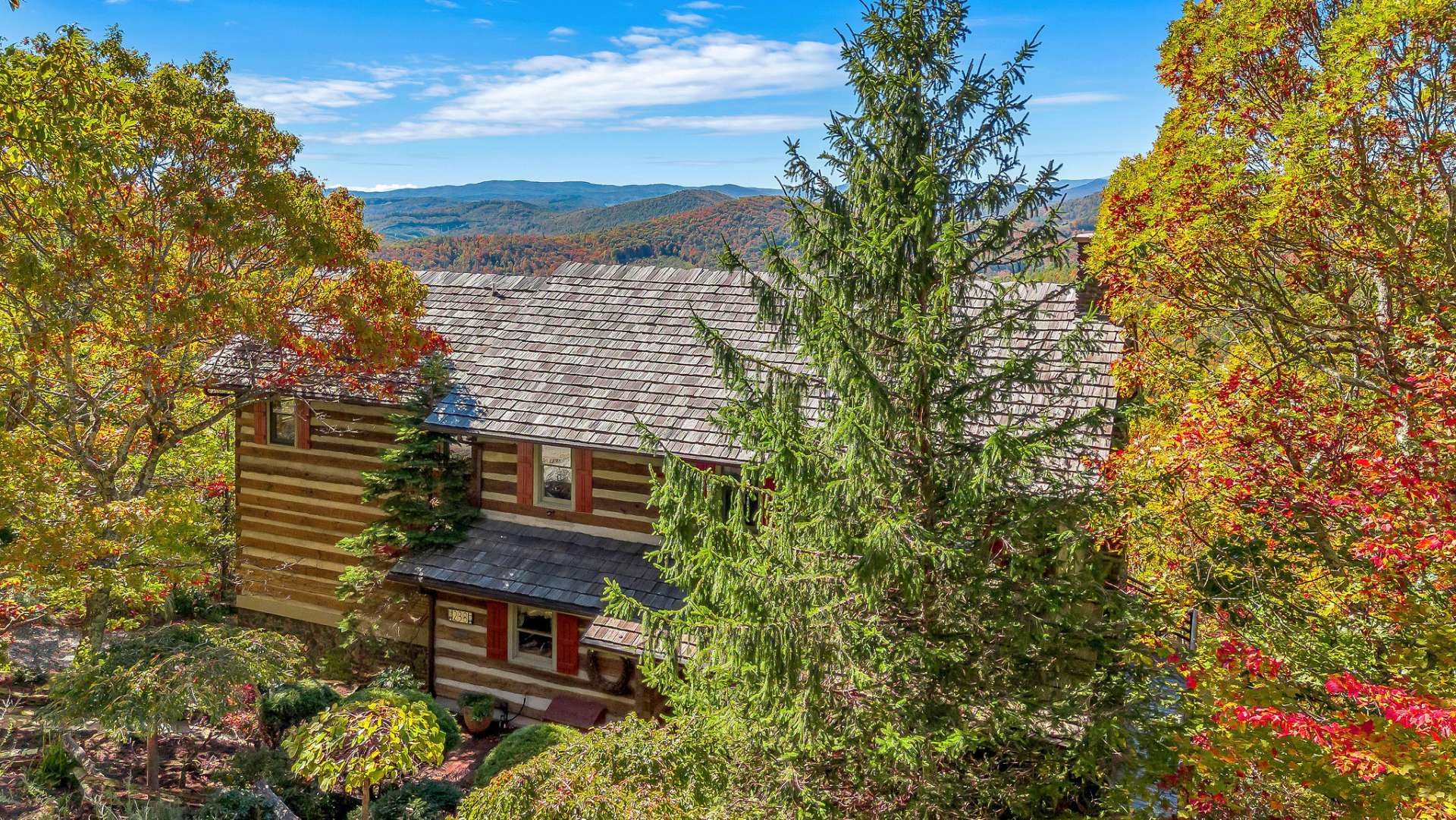 This cabin's beauty has blended seamlessly into perfect harmony with nature.