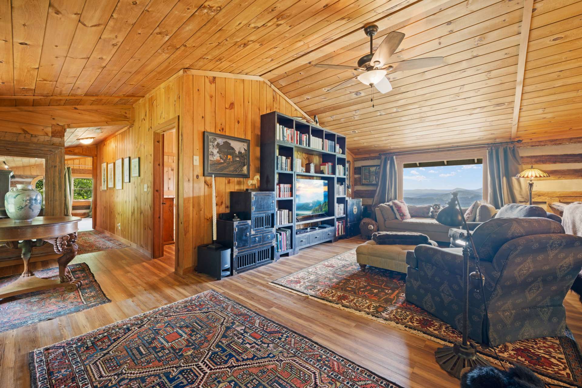 The expansive loft with an incredible view offers more space and is ideal for a second living area, office, or creative retreat.