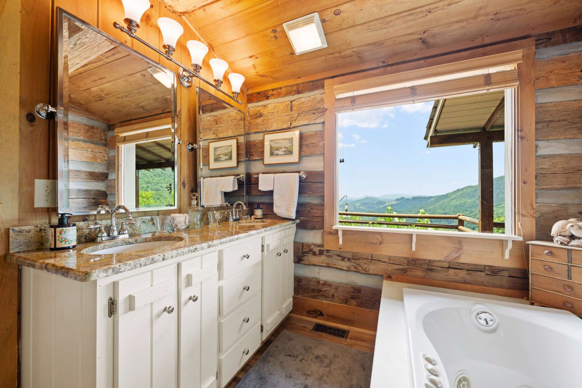 Enjoy a long soak or shower with the ever changing sky just beyond the picture window.