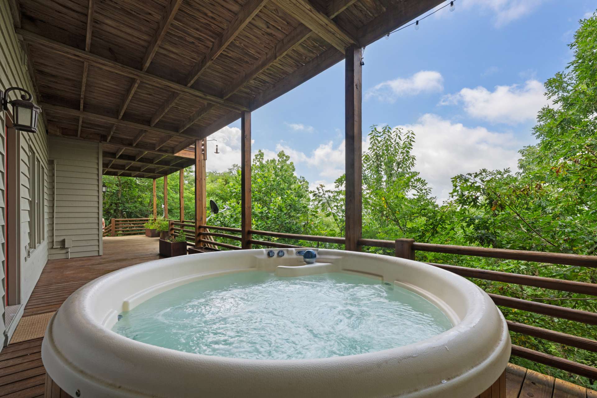 Let the inviting hot tub ease your muscles after a day of exploring—afternoon soaks beneath drifting clouds lead effortlessly into tranquil mountain evenings under a star-filled sky.