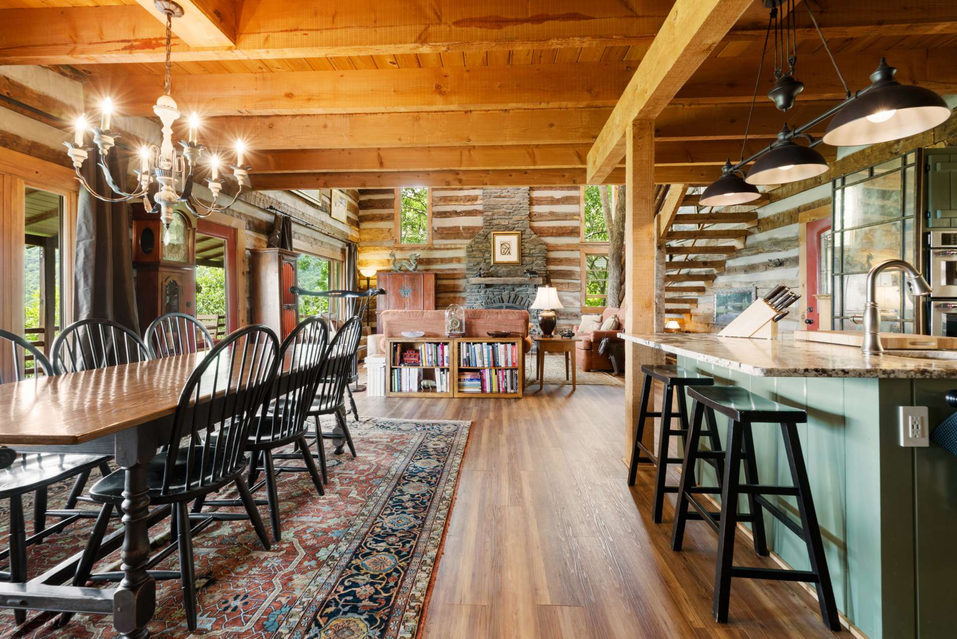 Dine in with a gorgeous view—this inviting space captures long-range mountain vistas and connects seamlessly to outdoor living areas.