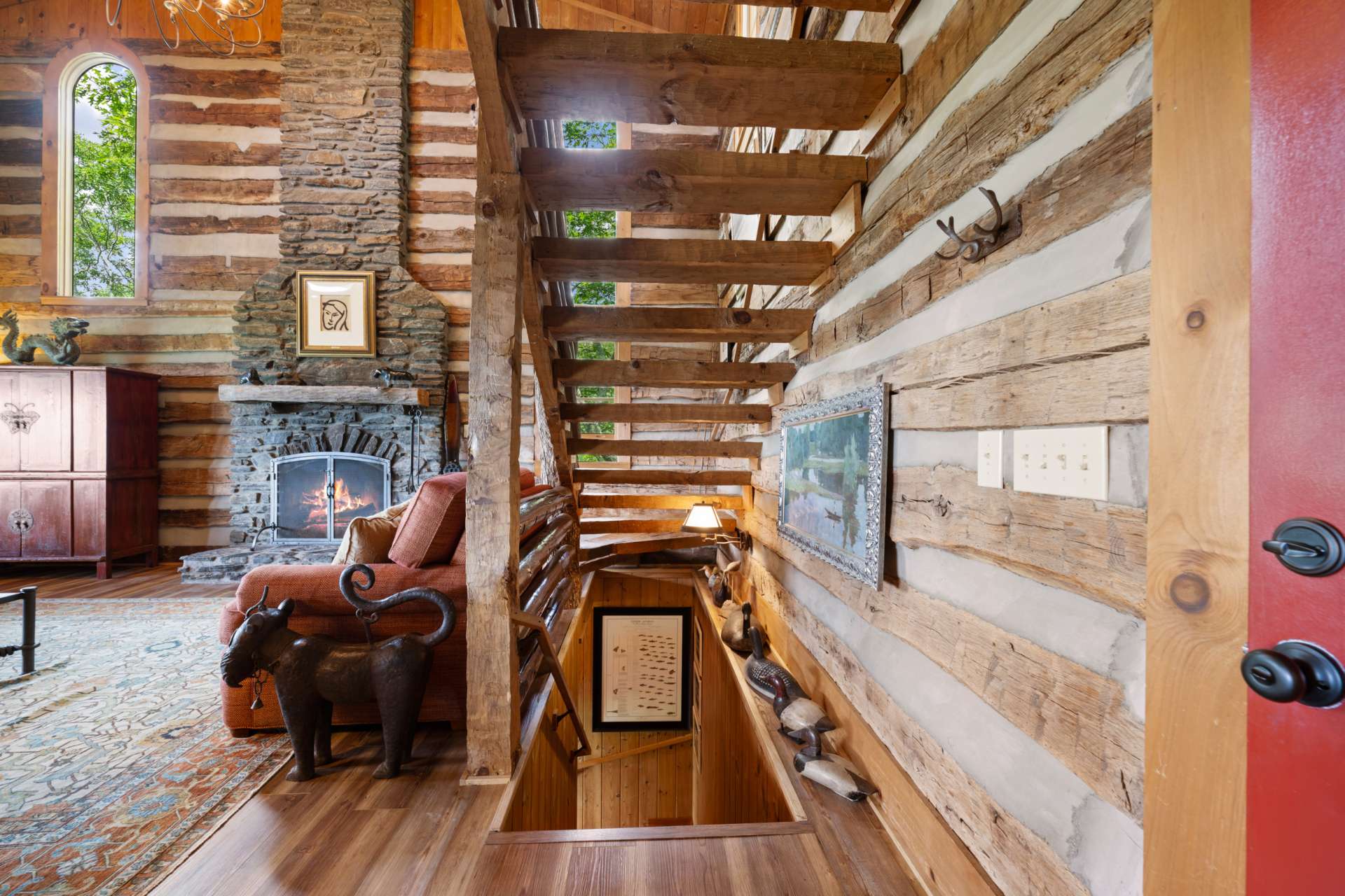 The cabin's lower level continues to impress with beautifully finished spaces perfect for relaxing, hosting, or pursuing hobbies.