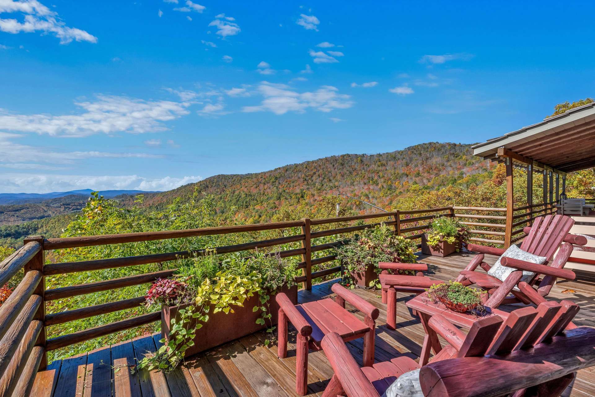 Easy access to the deck, where mountain breezes and uninterrupted glorious views greet you each day.