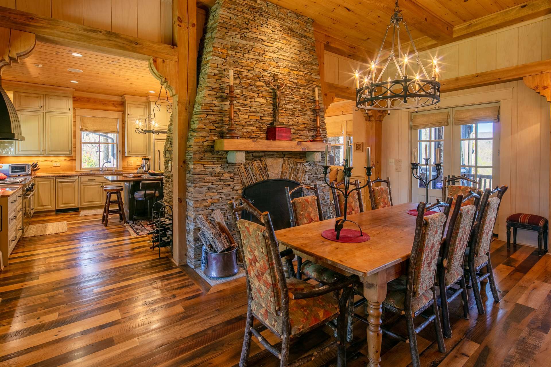 The great room offers formal dining by the fireplace as well as a nook featuring a unique vaulted ceiling.