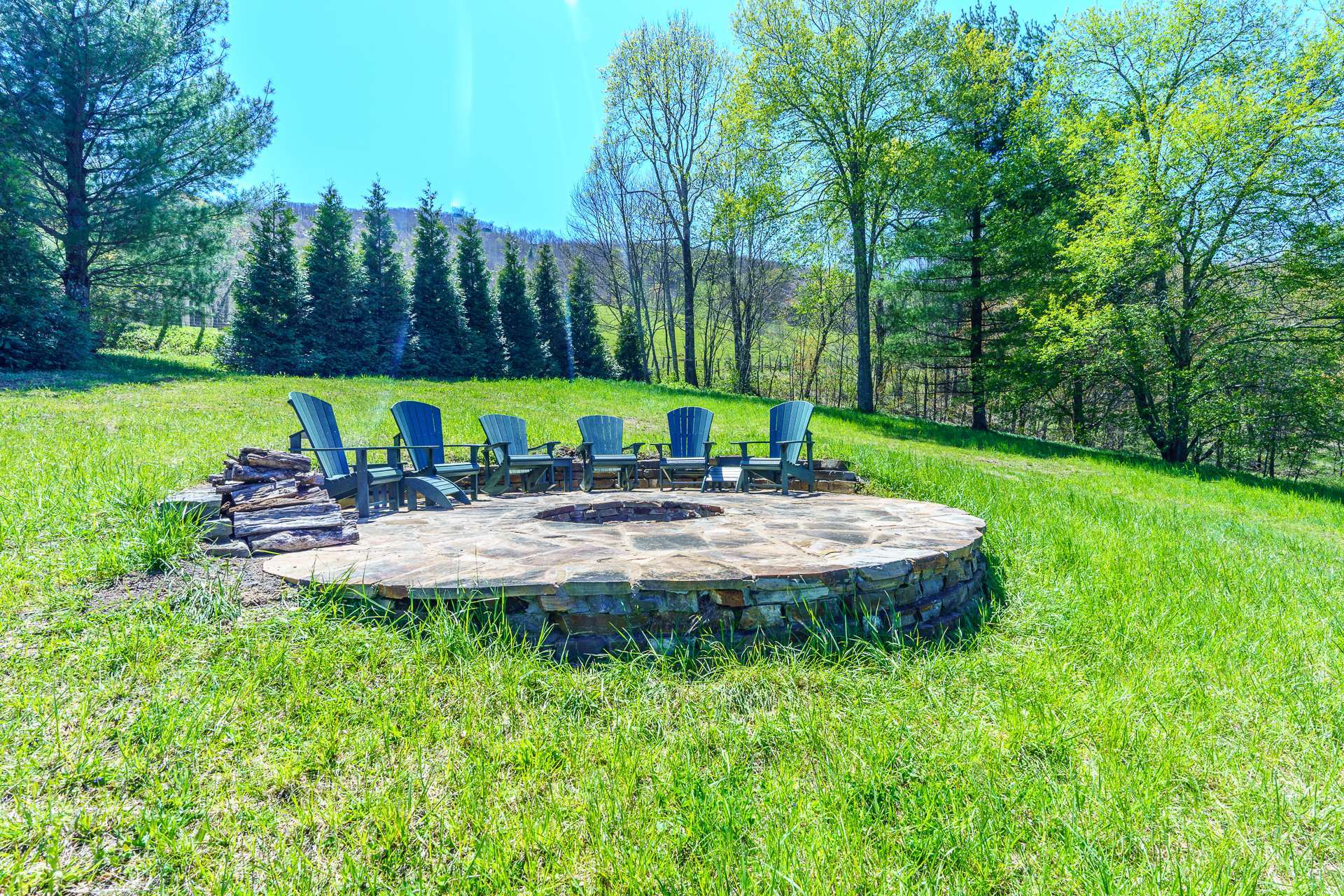 Enjoy star gazing and roasting marshmallows in the fire pit at this cleared knoll with long-range mountain views.