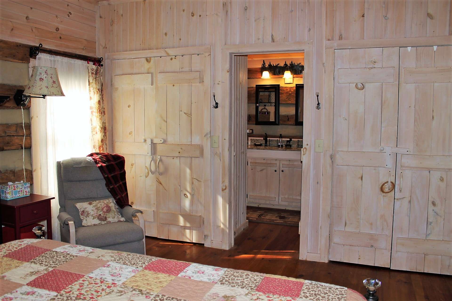 Double closets flank the attached bath.