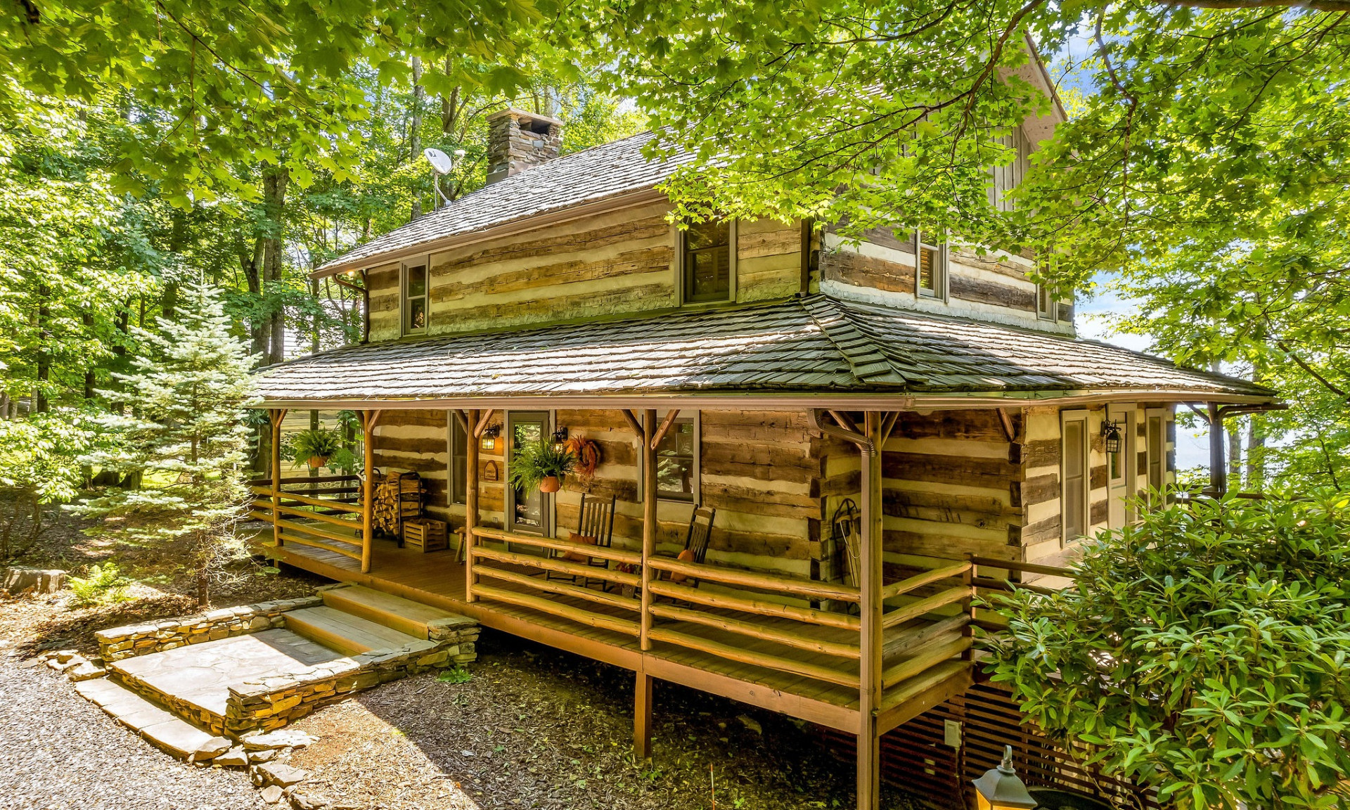 Timeless Antique Log Home in the community of Stonebridge located between West Jefferson & Boone.