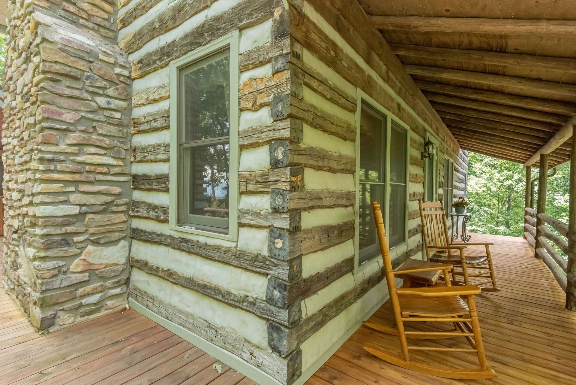 Wrap around deck leads to the front porch area.