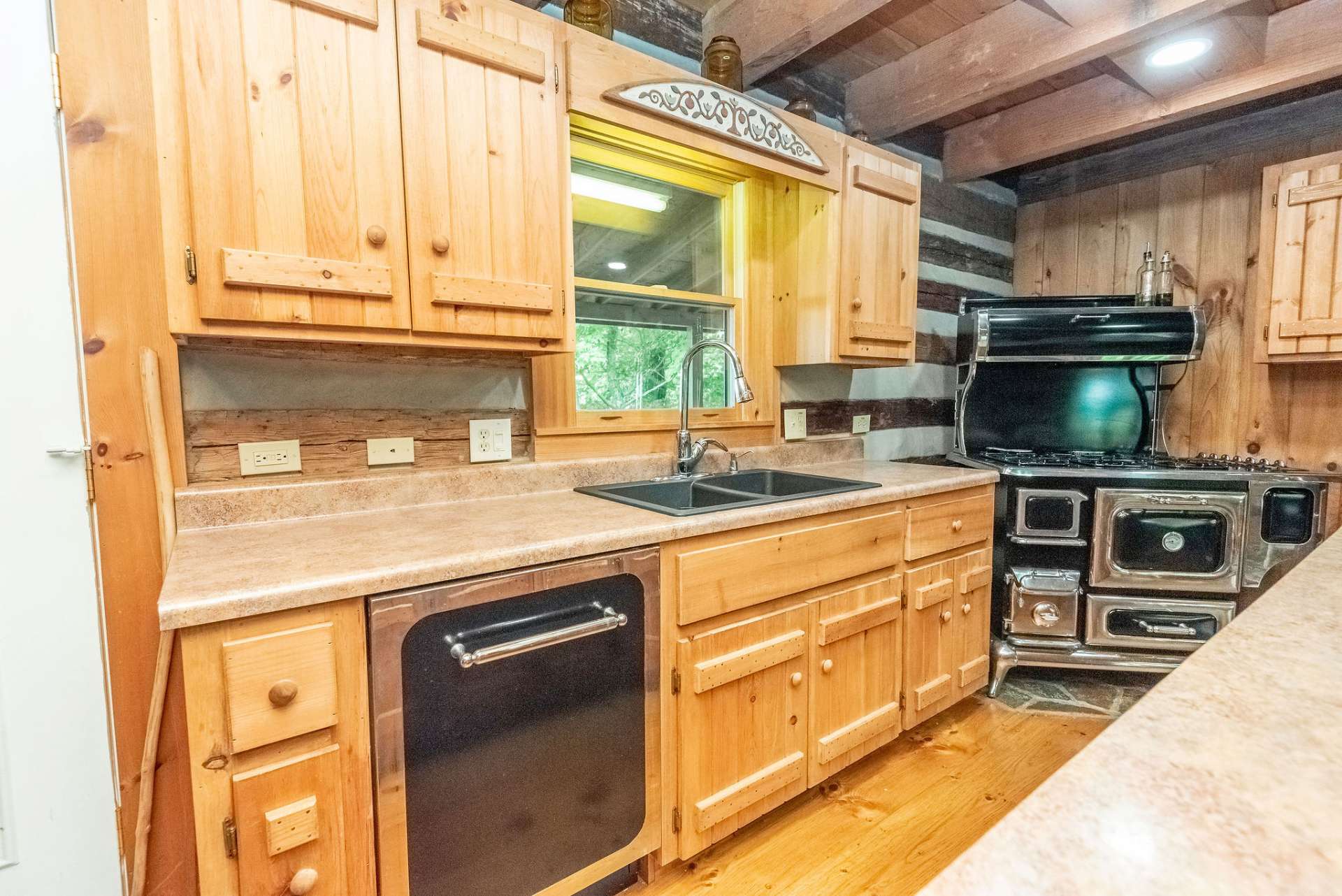 Kitchen was designed with unique appliances.