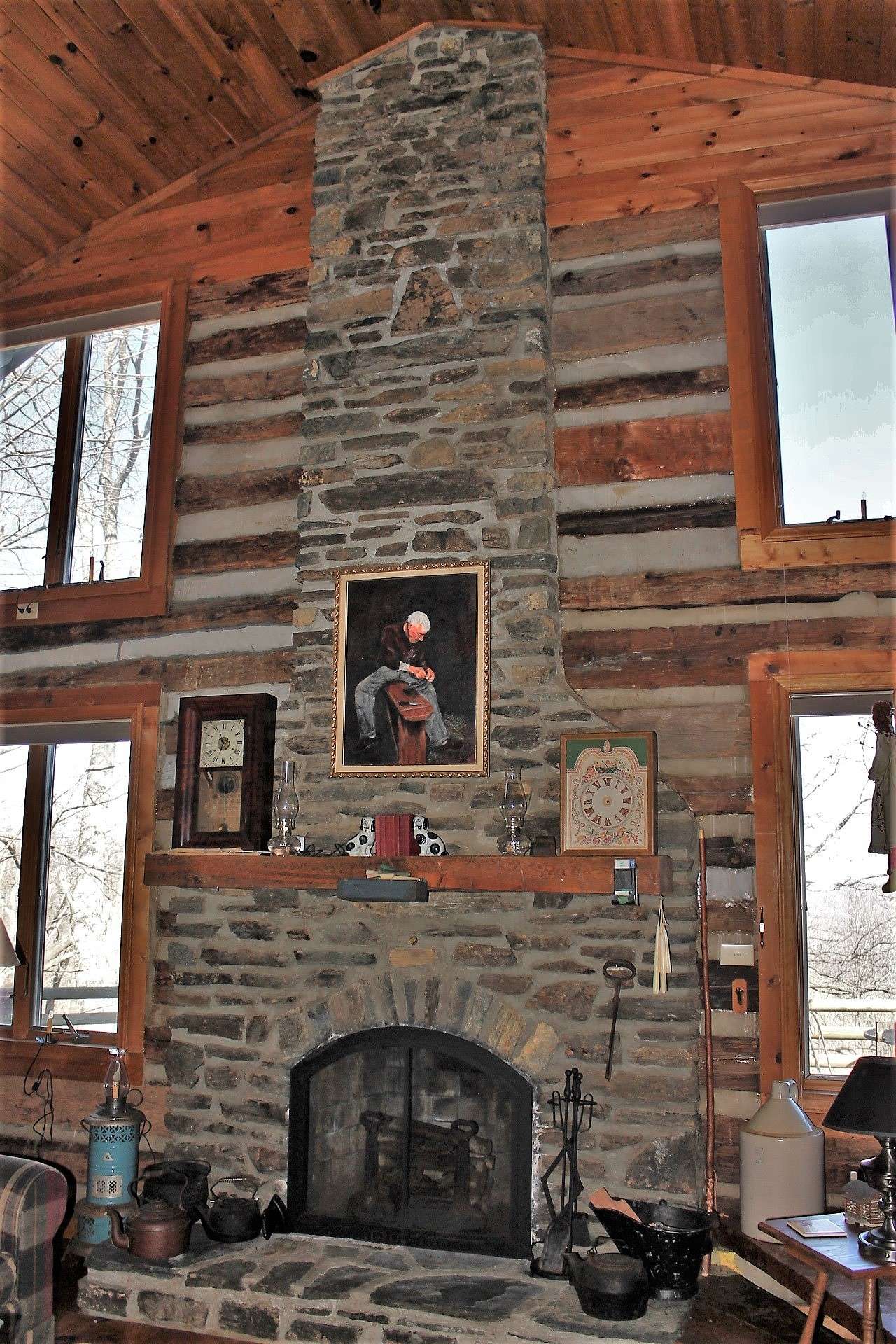 The wood burning fireplace enhances the cabin feel while providing added warmth on cool winter evenings.  The abundant windows fill the home with natural light and allows you to enjoy the views throughout all four seasons in the NC Mountains.