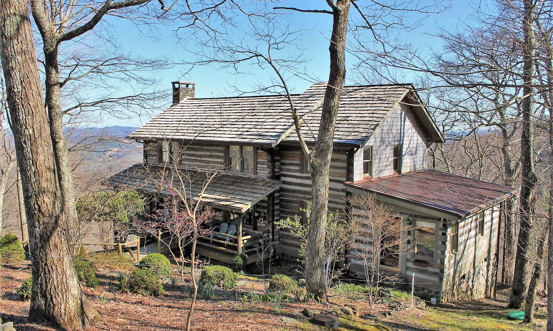 Welcome to this spacious 3 bedroom 3 bath antique log cabin located in the desirable community of Stonebridge located in the Todd area of Southern Ashe County.