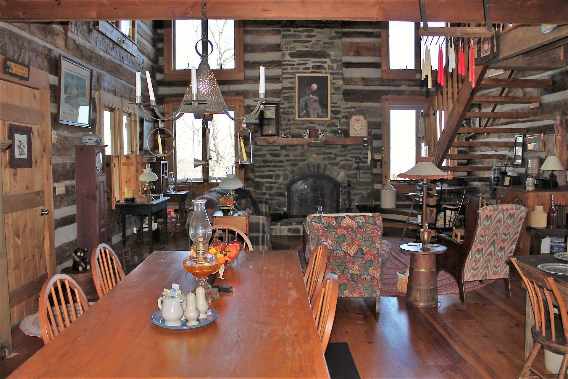 The great room keeps the living, kitchen and dining areas open to each other.  It won't be hard to get the family together for meals when you come to the cabin.