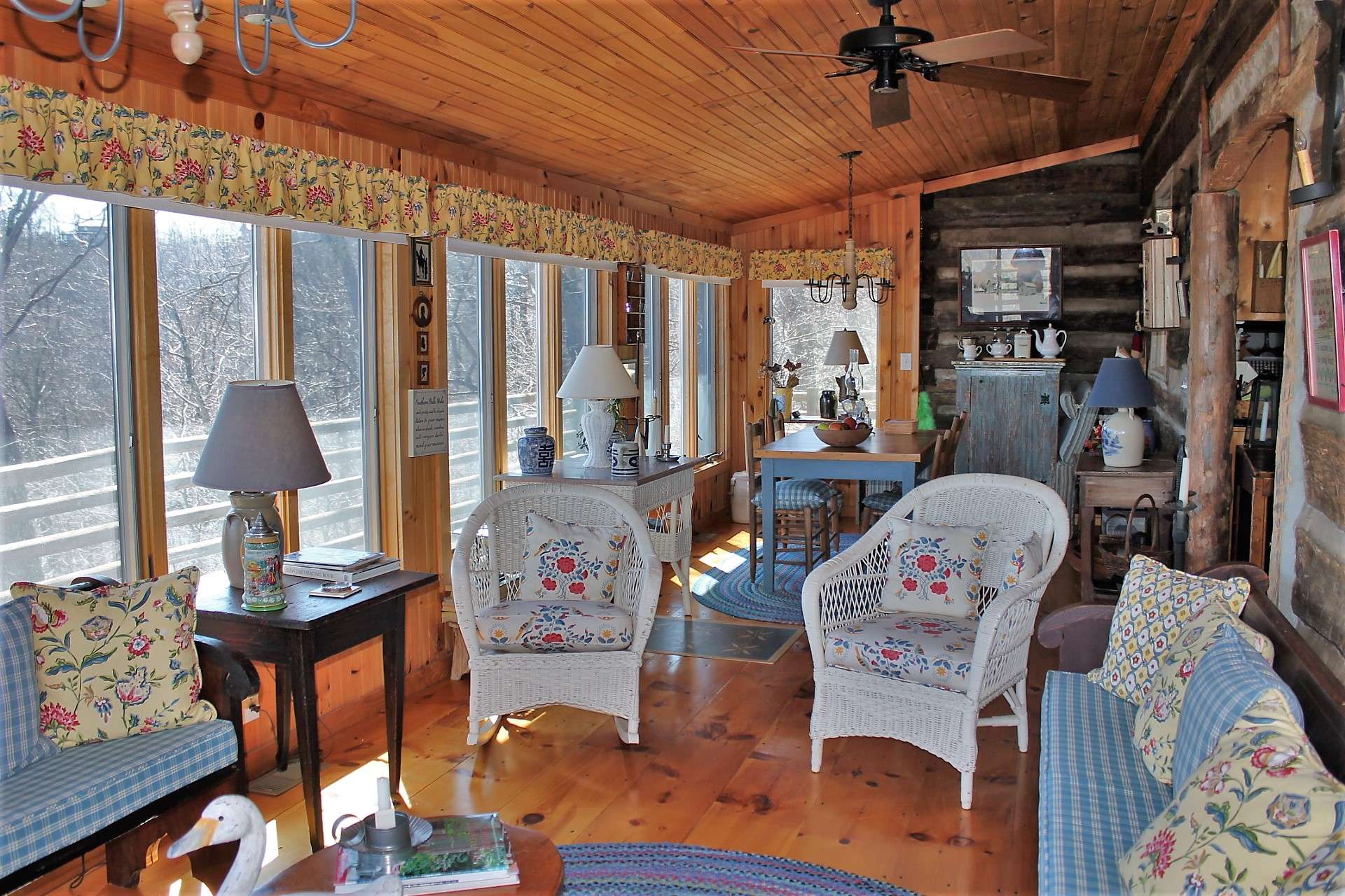 Your favorite spot in the cabin might be this bright sunroom with abundant windows to bring in the light.