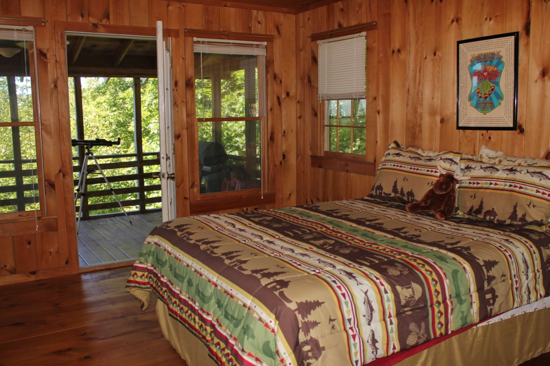 The owner's suite is conveniently located on the main level and offers private access to the screened porch.