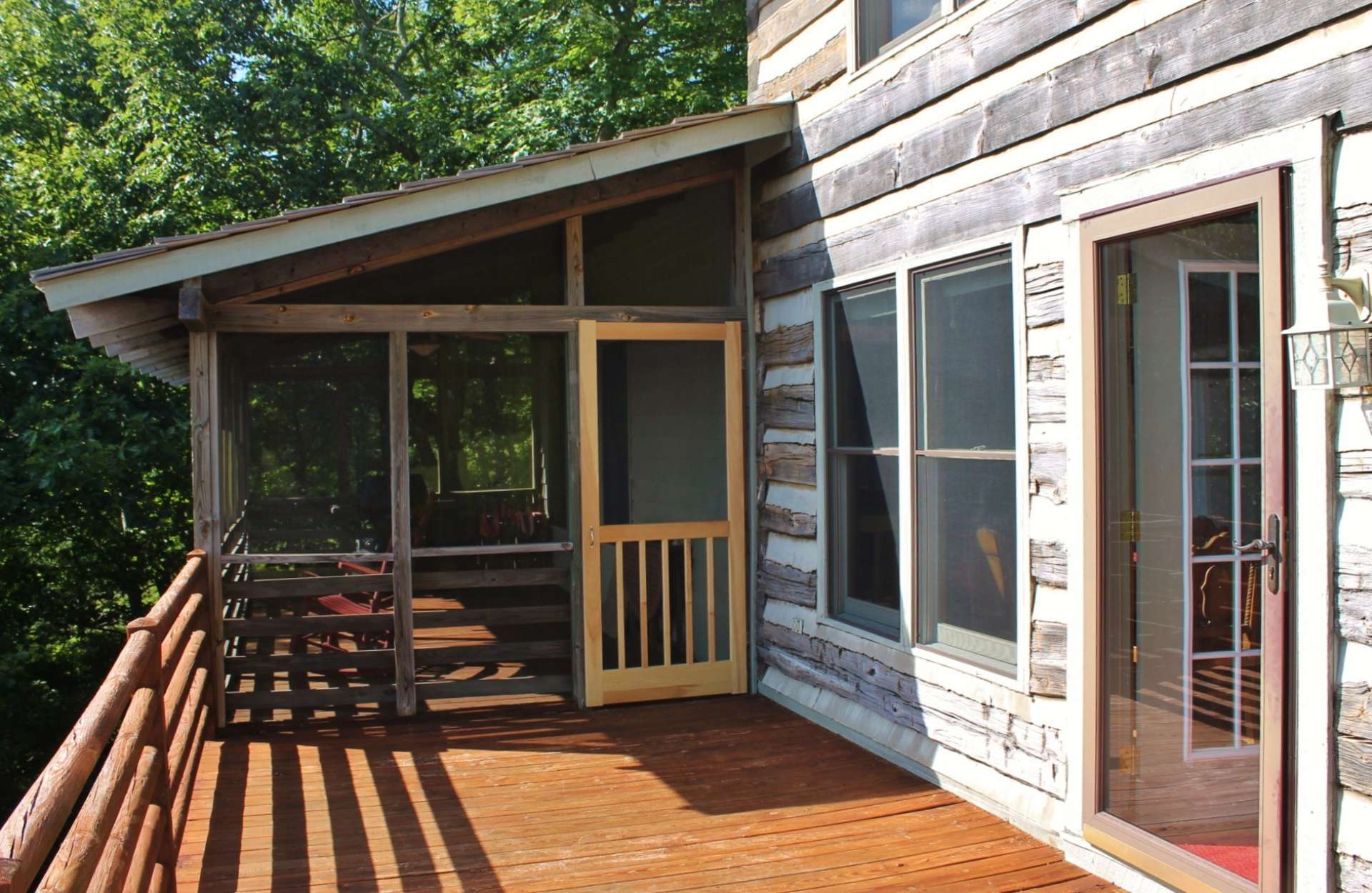 Easy access to the back deck, with screened in porch, allows you to take the party outdoors and enjoy the views, the sounds of Nature, and the fresh mountain air.