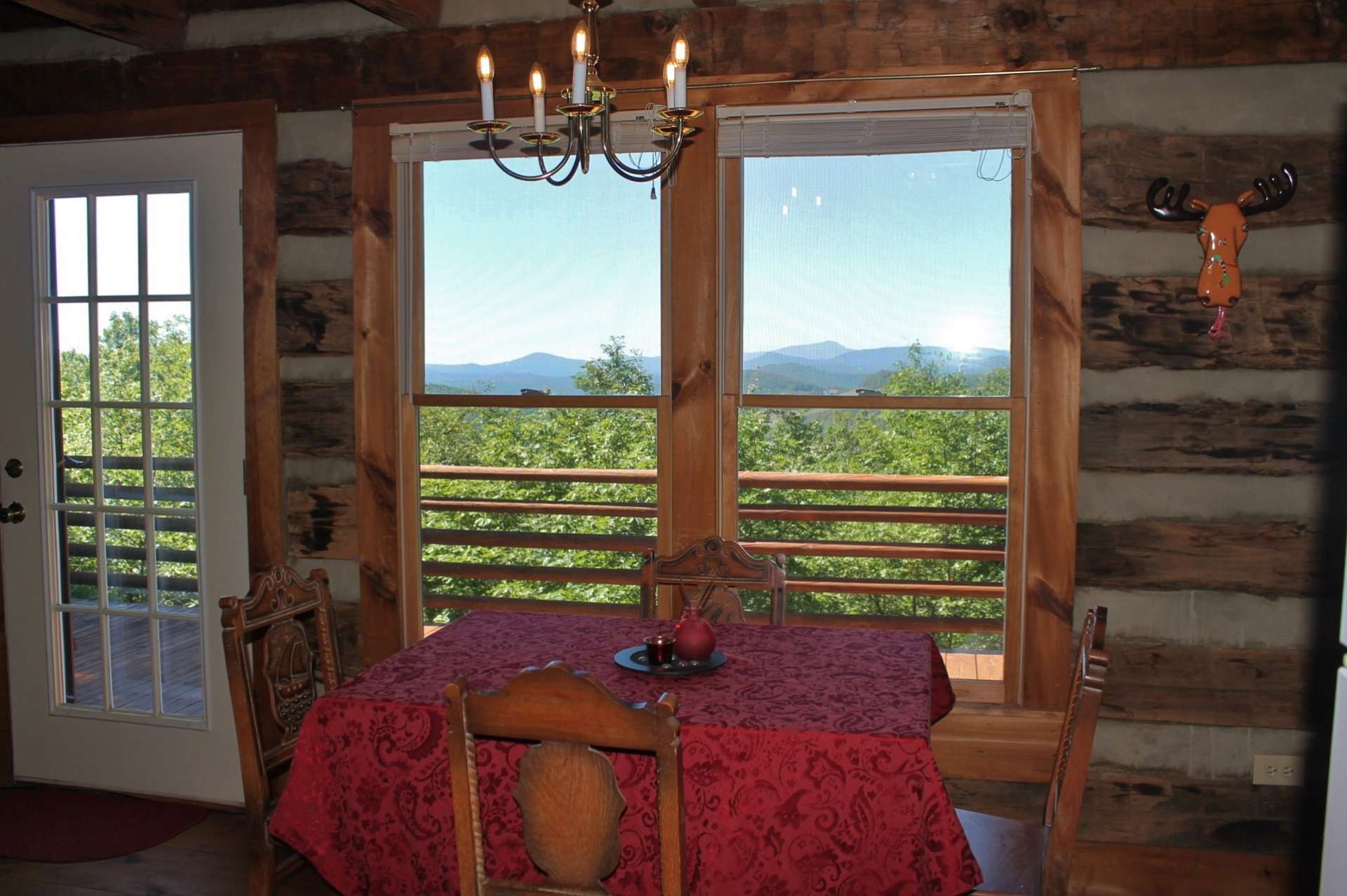 The dining area allows enjoyment of the views and perfect for entertaining dinner guests throughout all four seasons in the North Carolina Mountains.