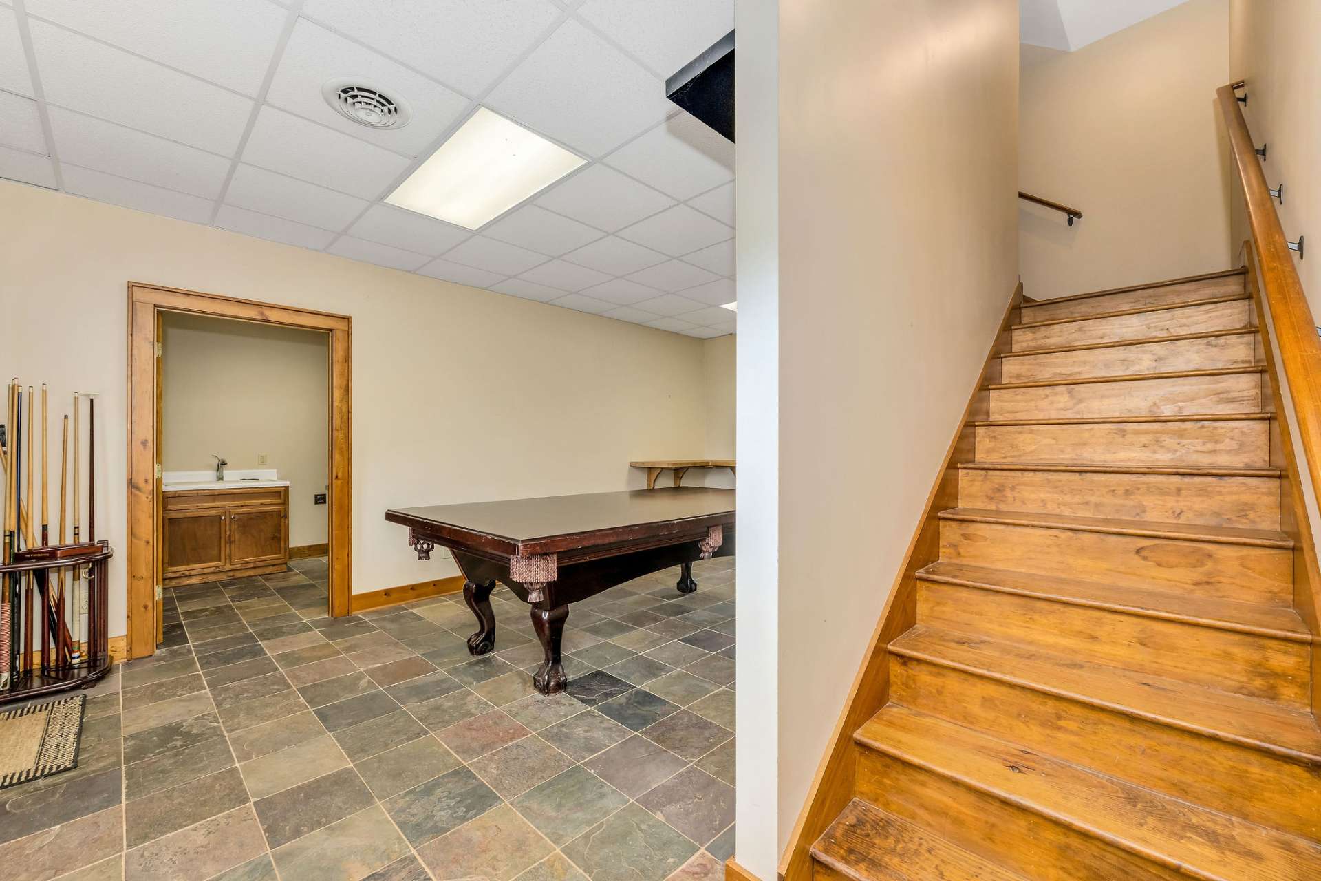 Basement game room with plenty of space for your pool table and additional games