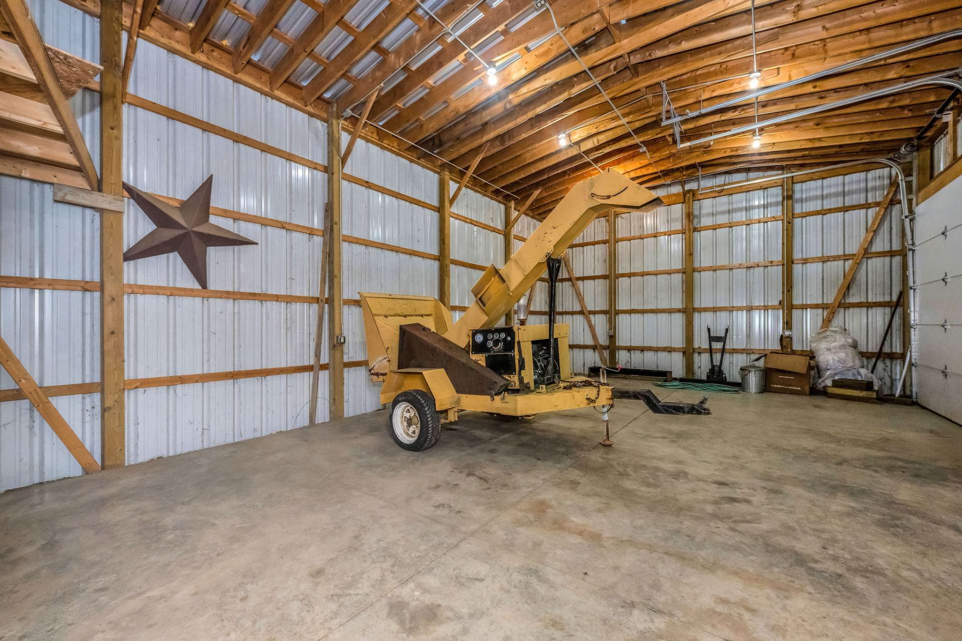A massive 3 bay shop for equipment, ATVs, vehicles, or storage