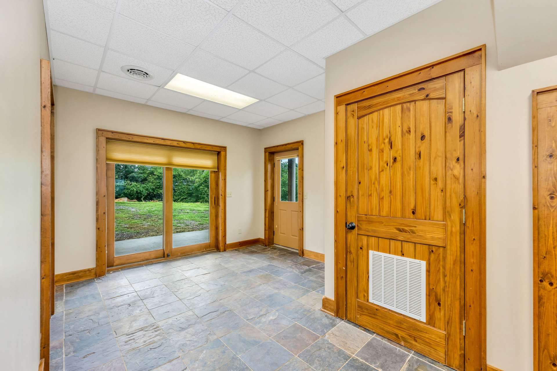 Grading is in place to facilitate a driveway down to this basement entrance for ease of access of your guests