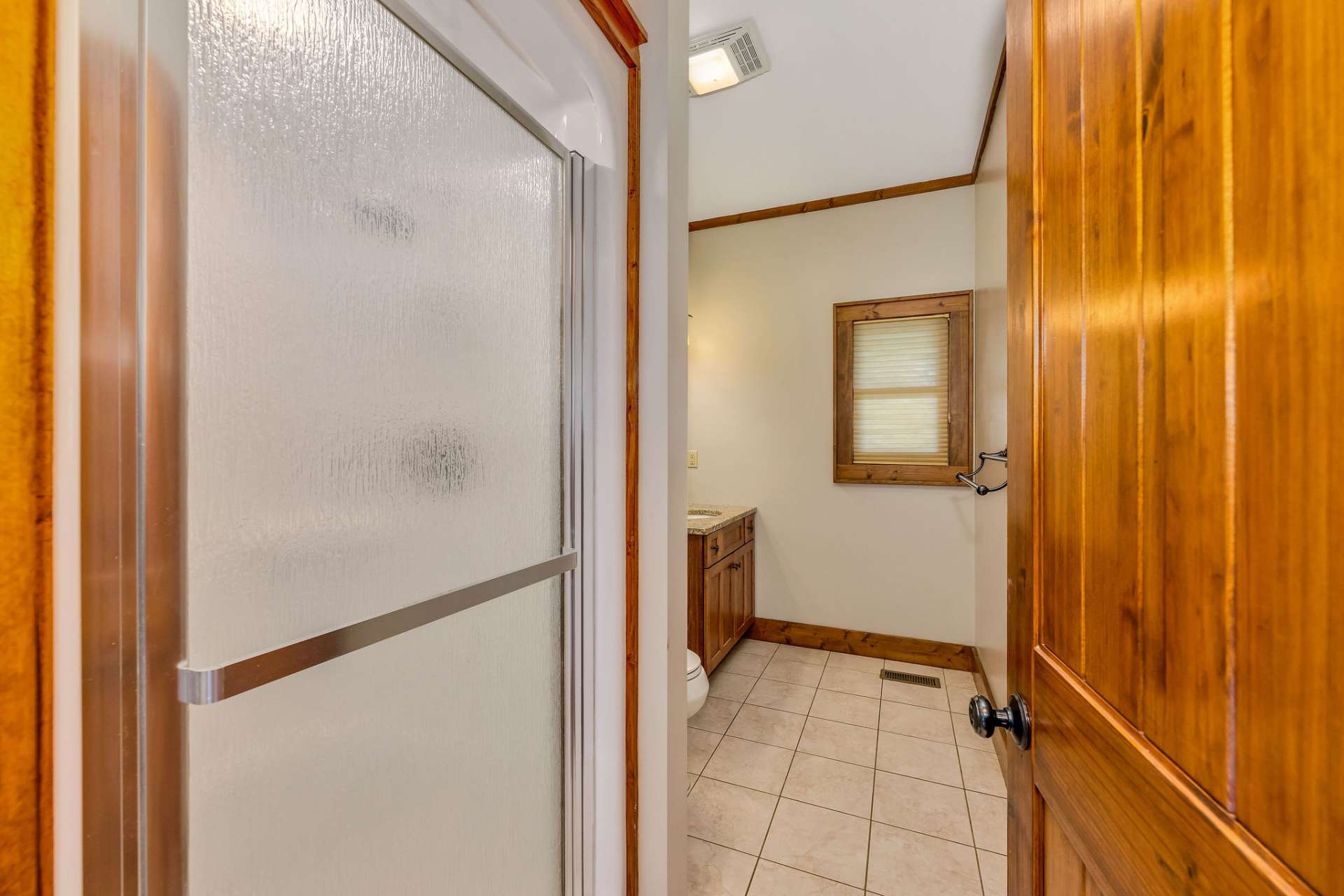 The wide plank trim and rich wood tones definitely show the quality of this home