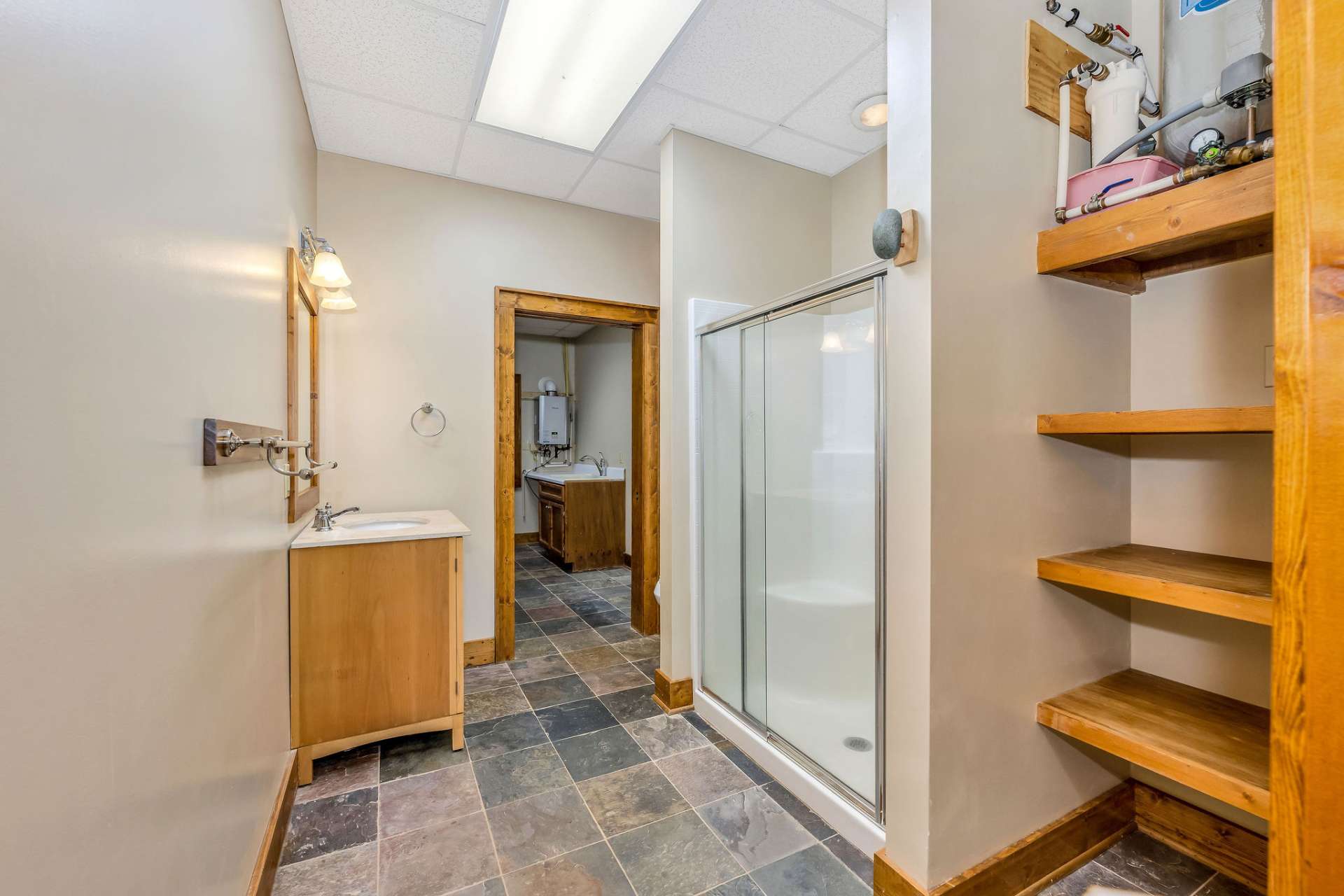 Private bath for your guests just off the bedroom in the basement