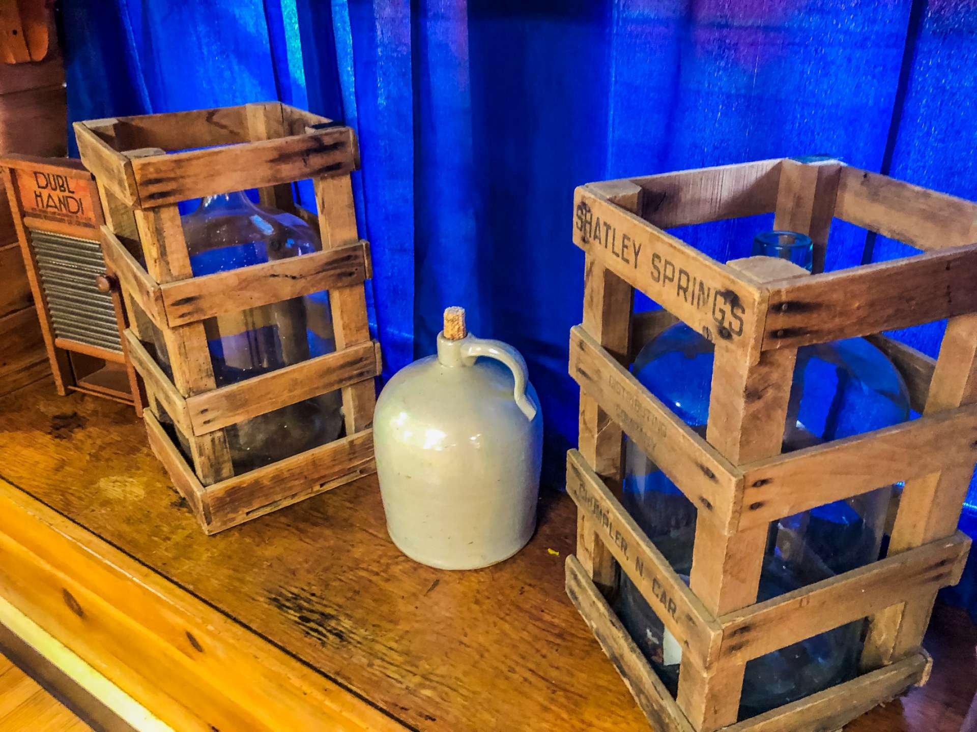 Examples of the antique bottles and jugs that have been used over the years to collect water from Shatley Springs.