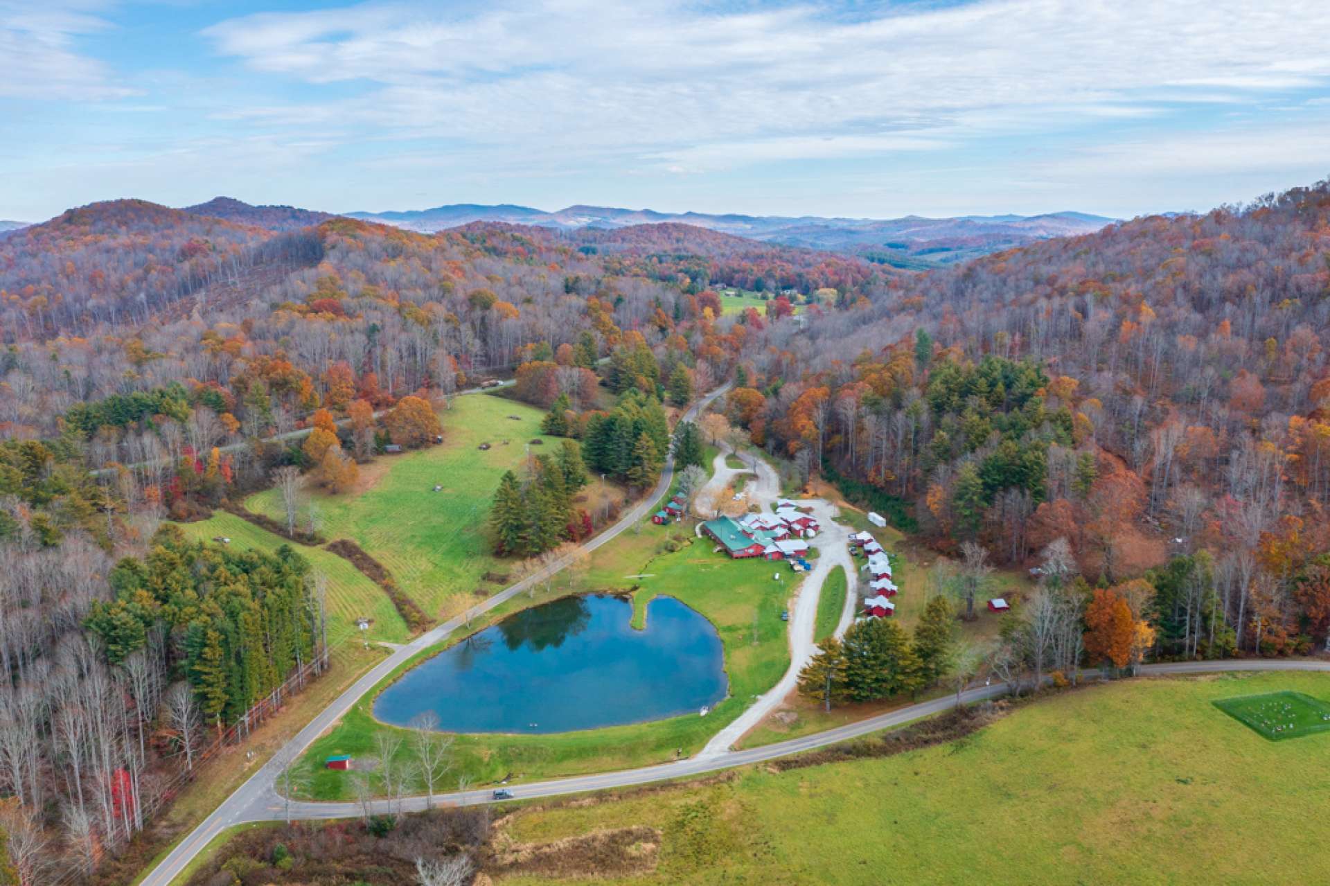 Aerial view of Shatley Springs Restaurant, pond, and cabins. Located in the Crumpler area of Ashe County, Shatley Springs is a popular destination for visitors to the NC High Country.