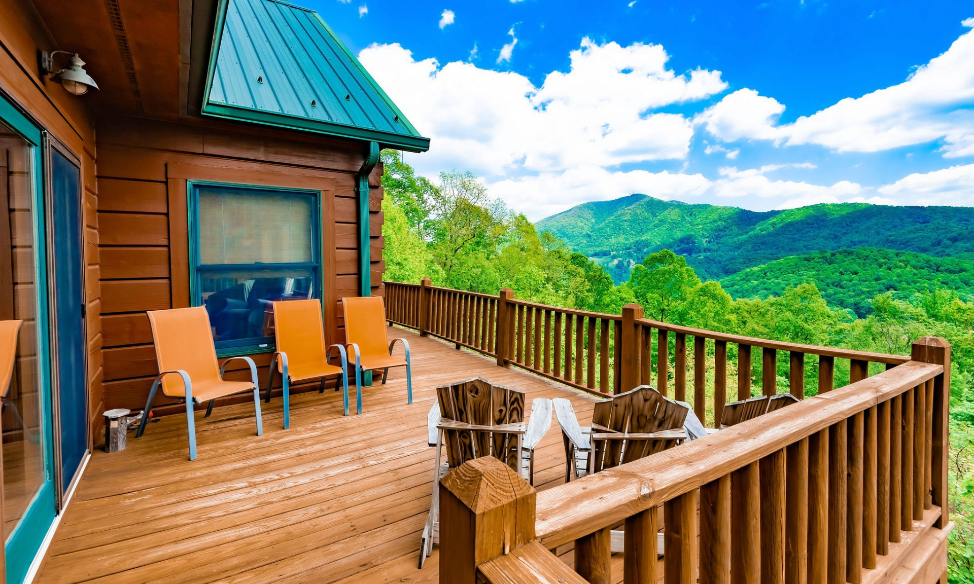 If you are looking for BIG views and privacy, this is the place!  This 3-bedroom, 2-bath log cabin is tucked back in a private wooded 13.7 acre setting off of Cameron Ridge Road in the Warrensville area of Ashe County, just minutes to West Jefferson.