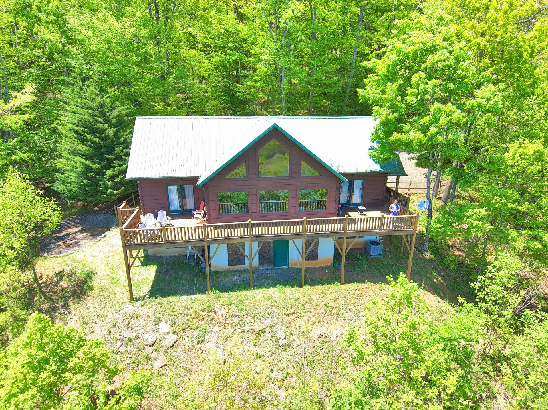 While this unique mountain estate is private, the location is only minutes to downtown West Jefferson for shopping and dining out.  Or, pack up the kayaks, tubes, and fishing poles for a day filled with water activities on the nearby New River.  Call today for additional information on listing N127, the ideal mountain retreat.