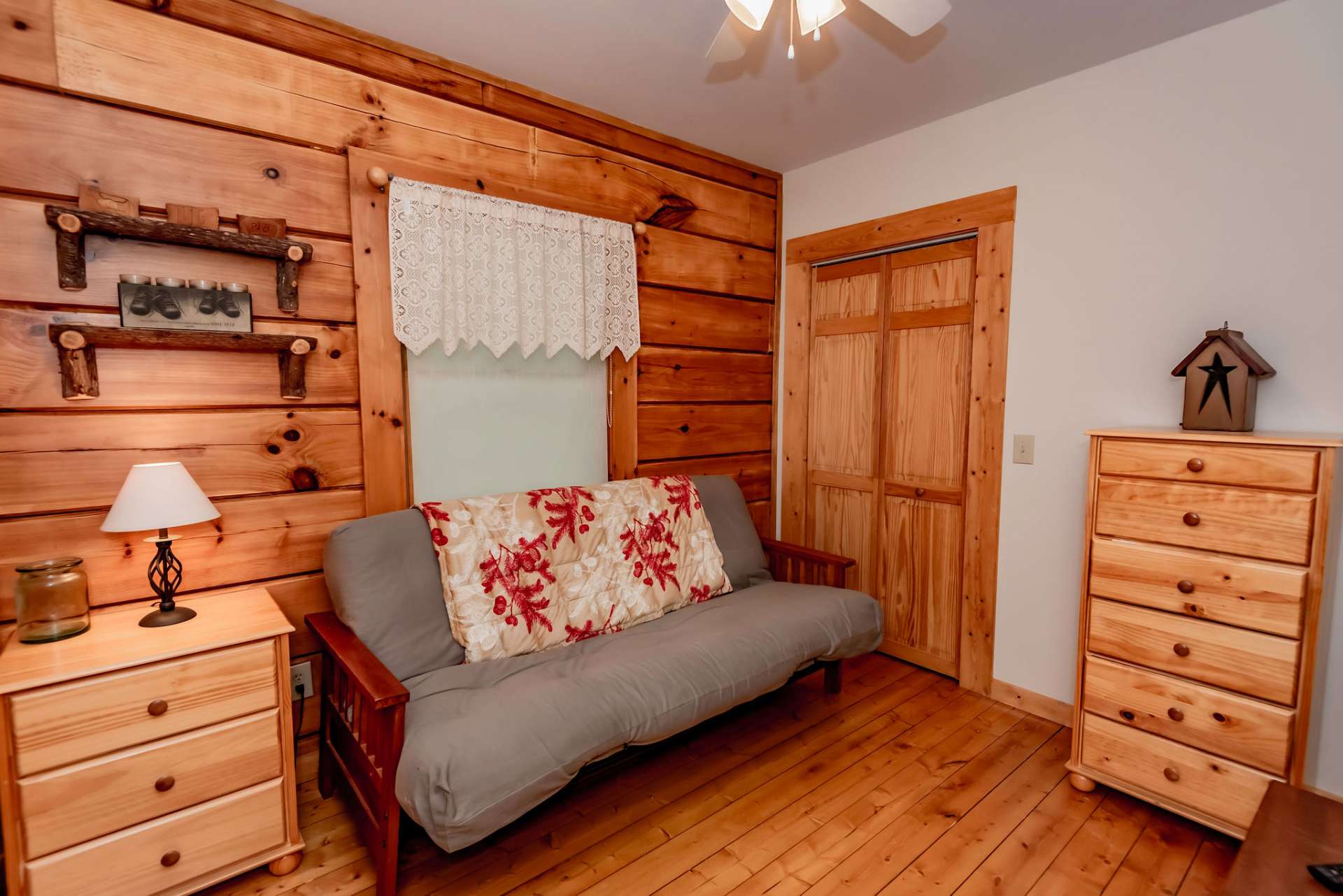 This is the second guest bedroom that could also be utilized as a home office, den/family room, or library space if desired.   A full walkout lower level is unfinished but offers expansion potential.