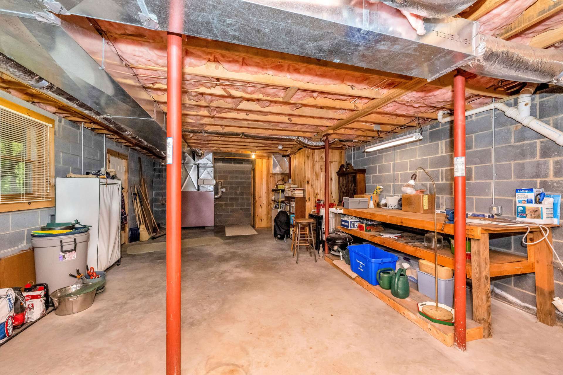 The unfinished basement provides ample room for storage, hobbies, or expansion into additional heated square footage.