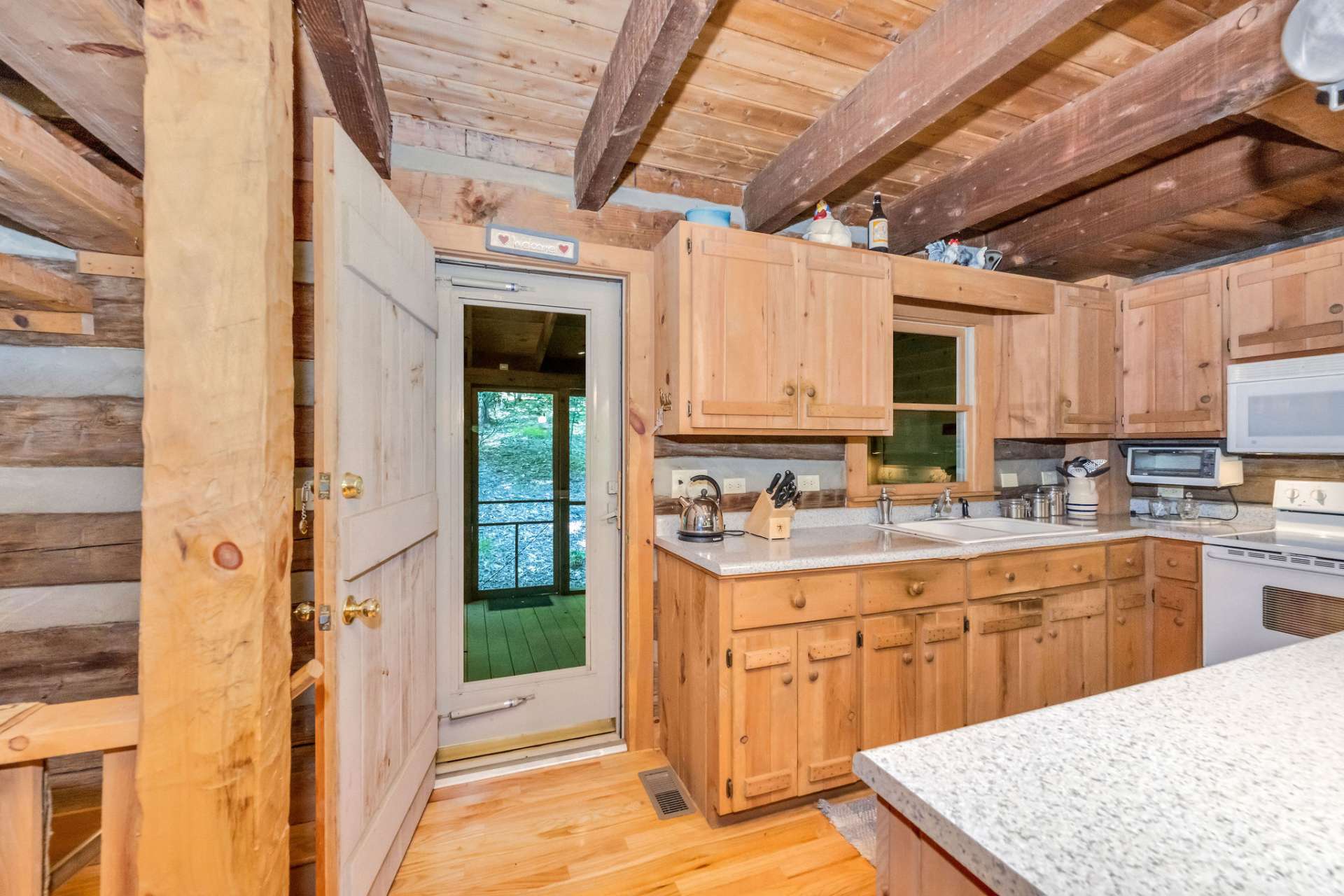 Enjoy seamless indoor-outdoor living and entertaining as the great room opens to multiple outdoor spaces.