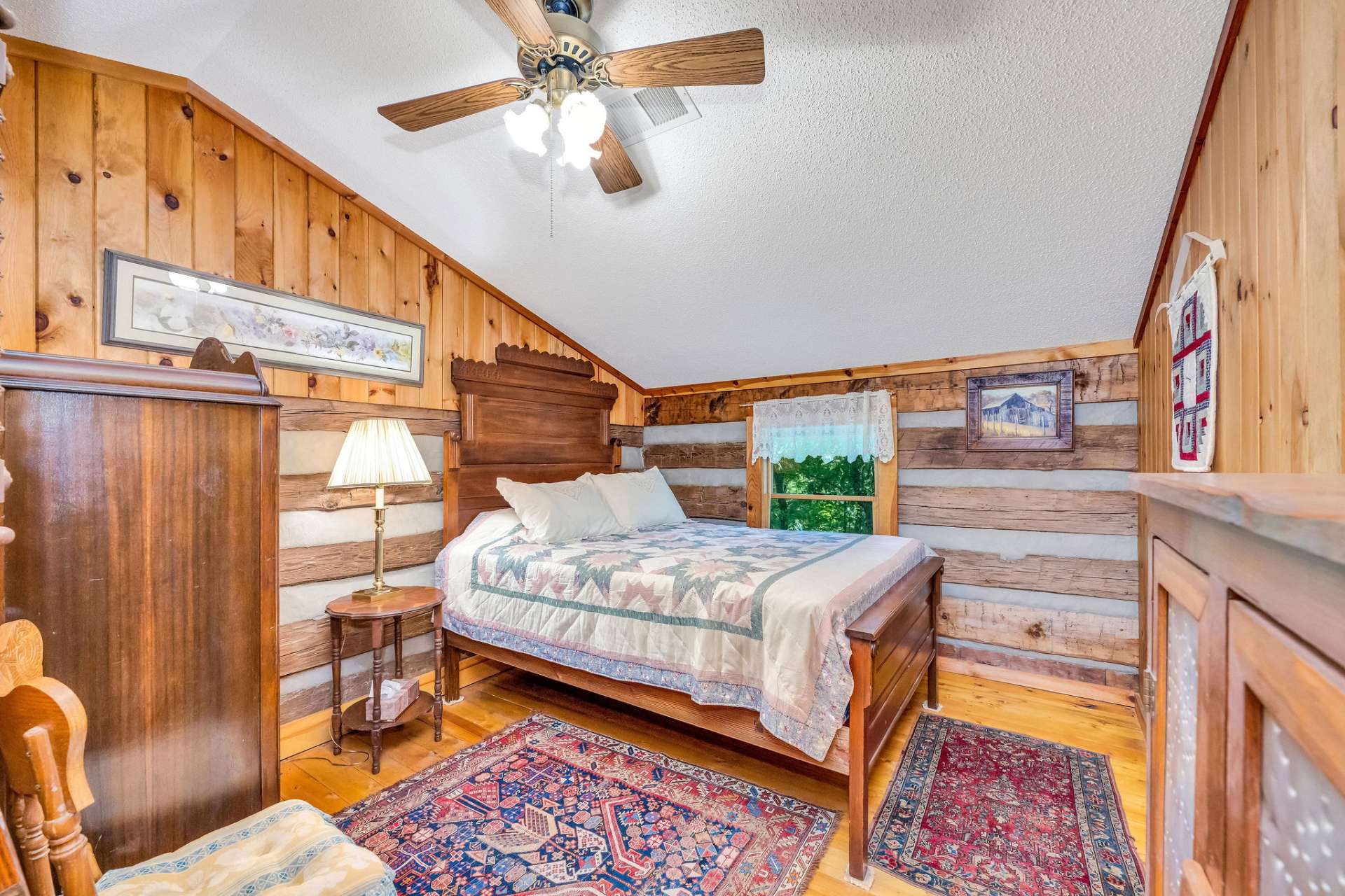 The second bedroom promises a cozy night’s sleep after a day of mountain adventure.