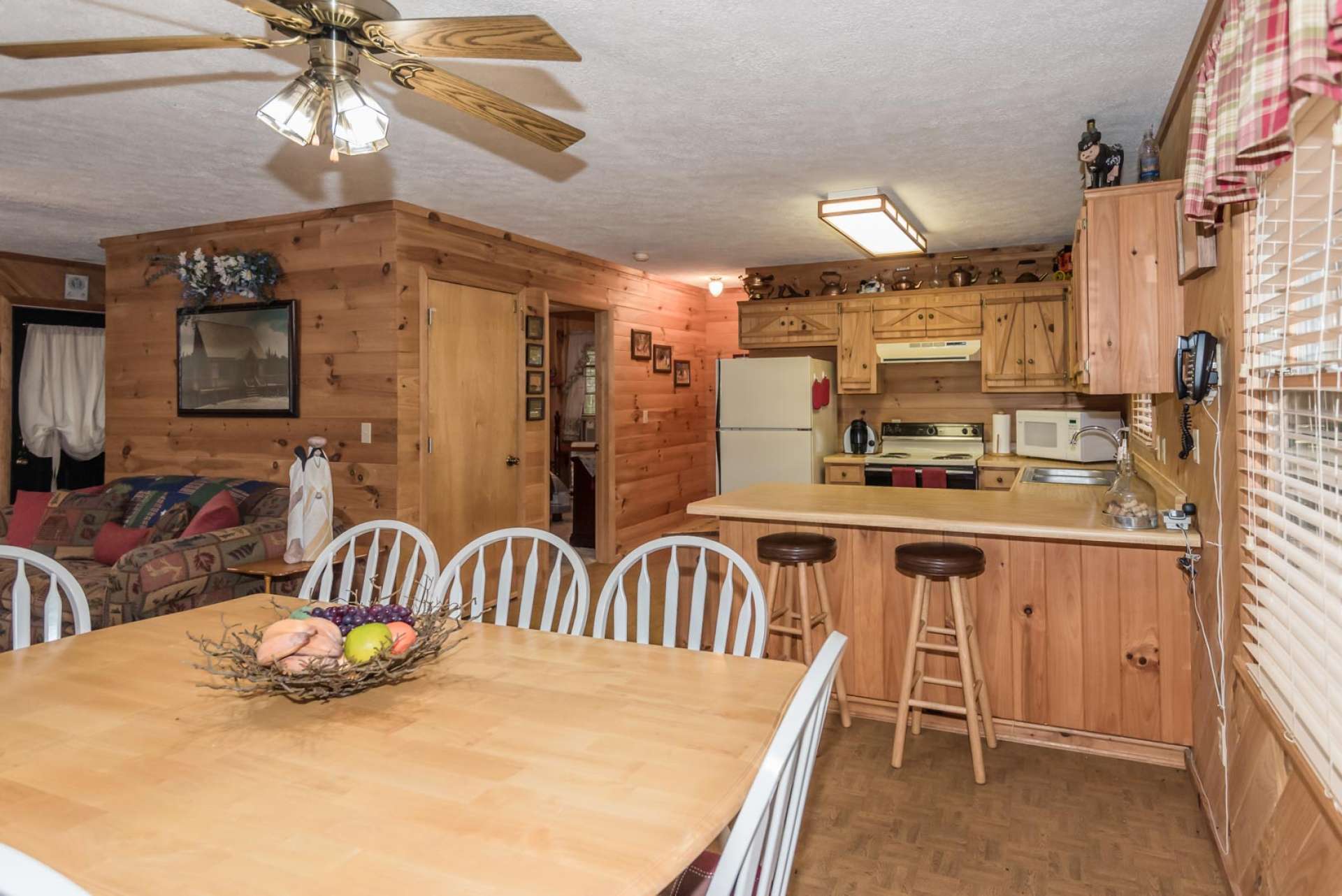 The kitchen area is efficient with ample work and storage space.  There is also plenty of room for help in the kitchen.