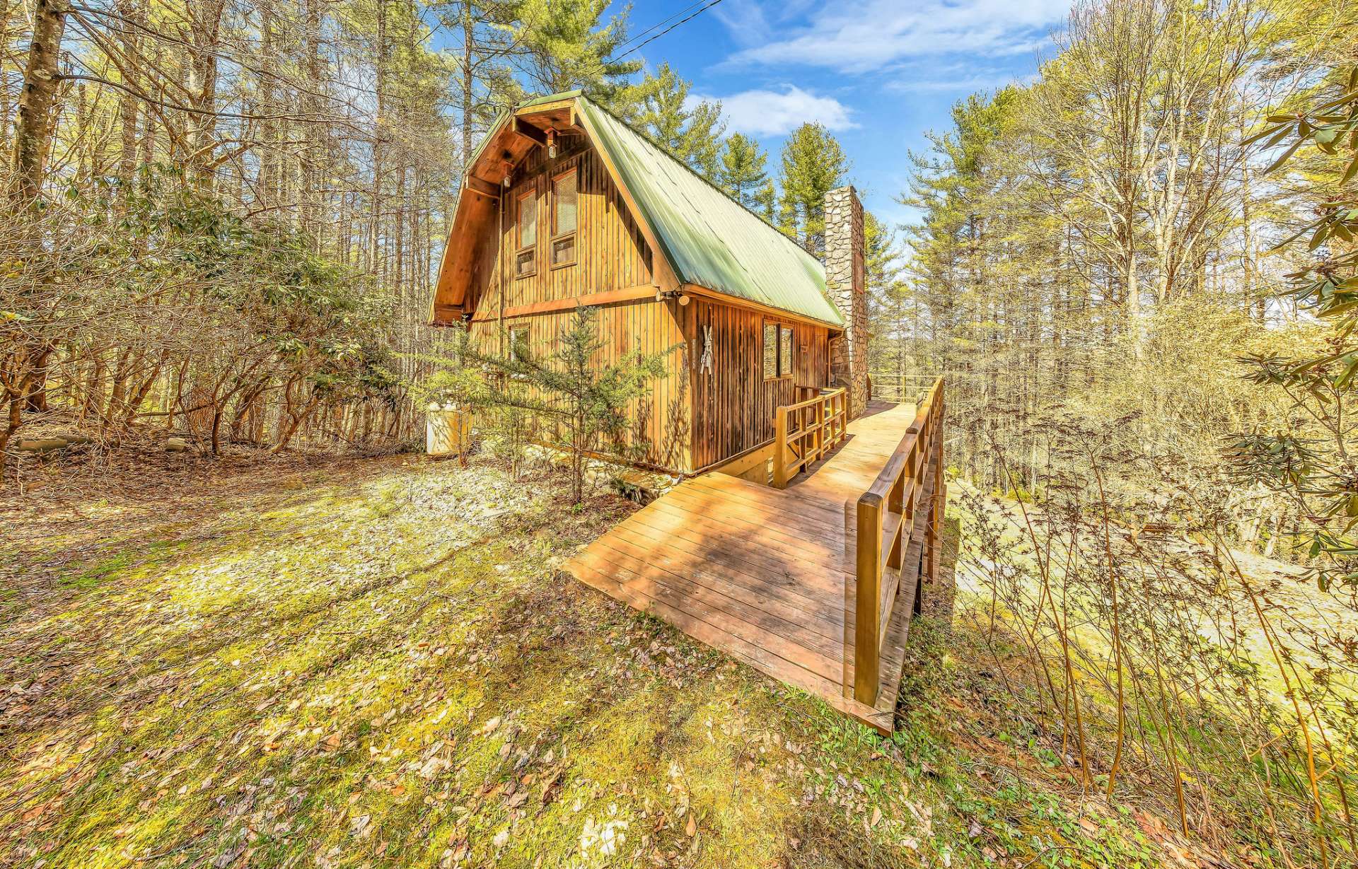 You will love the privacy this wooded setting provides.