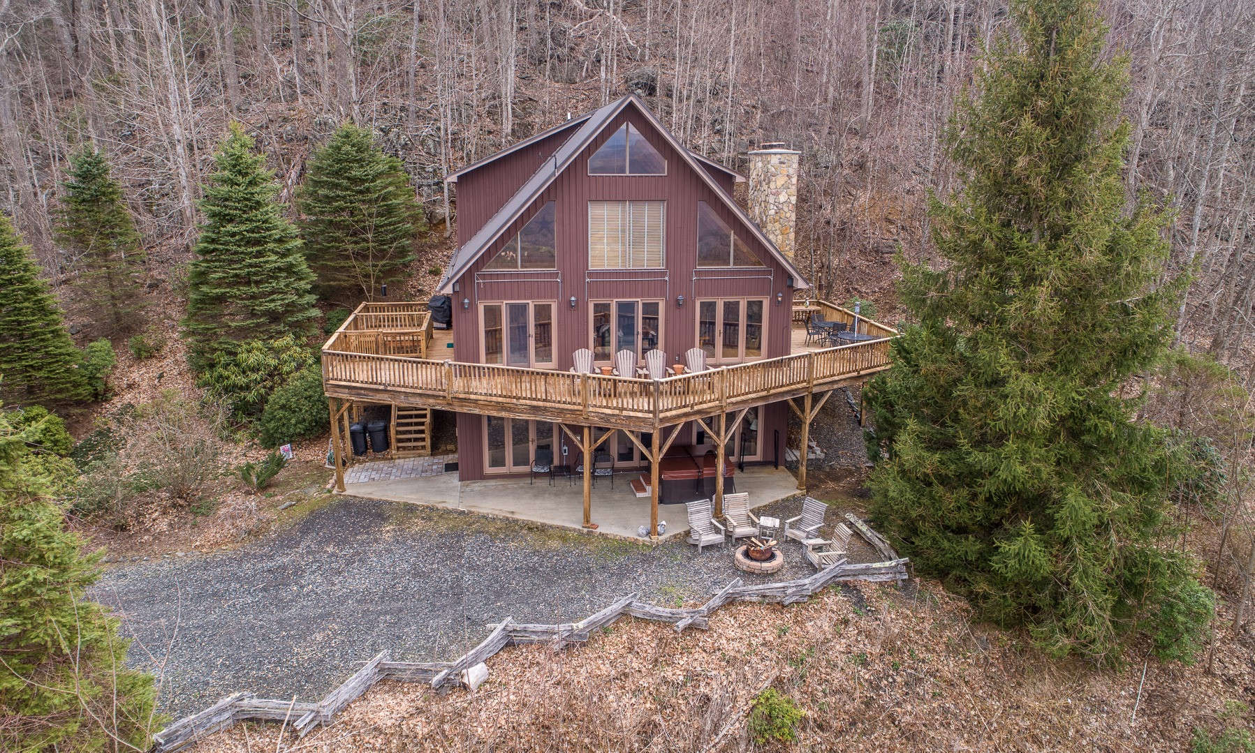 Majestically sited on a 15.92 acre setting for maximum privacy and views, this stunning Blue Ridge Mountain chalet  estate embraces all of Nature's wonder and  true mountain living.