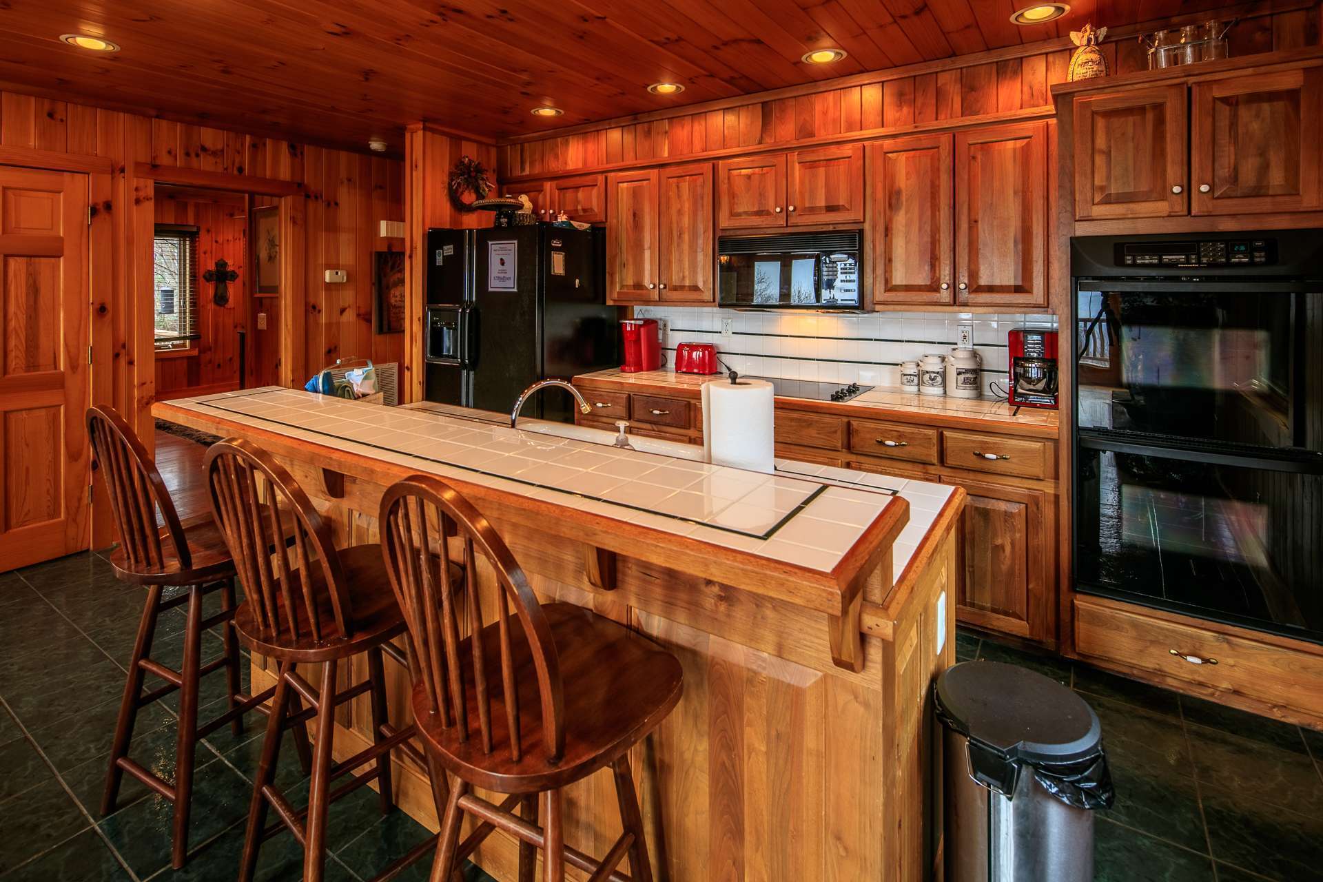 You can enjoy the views and stay involved in the conversation  when preparing meals for friends and family in the well appointed kitchen.