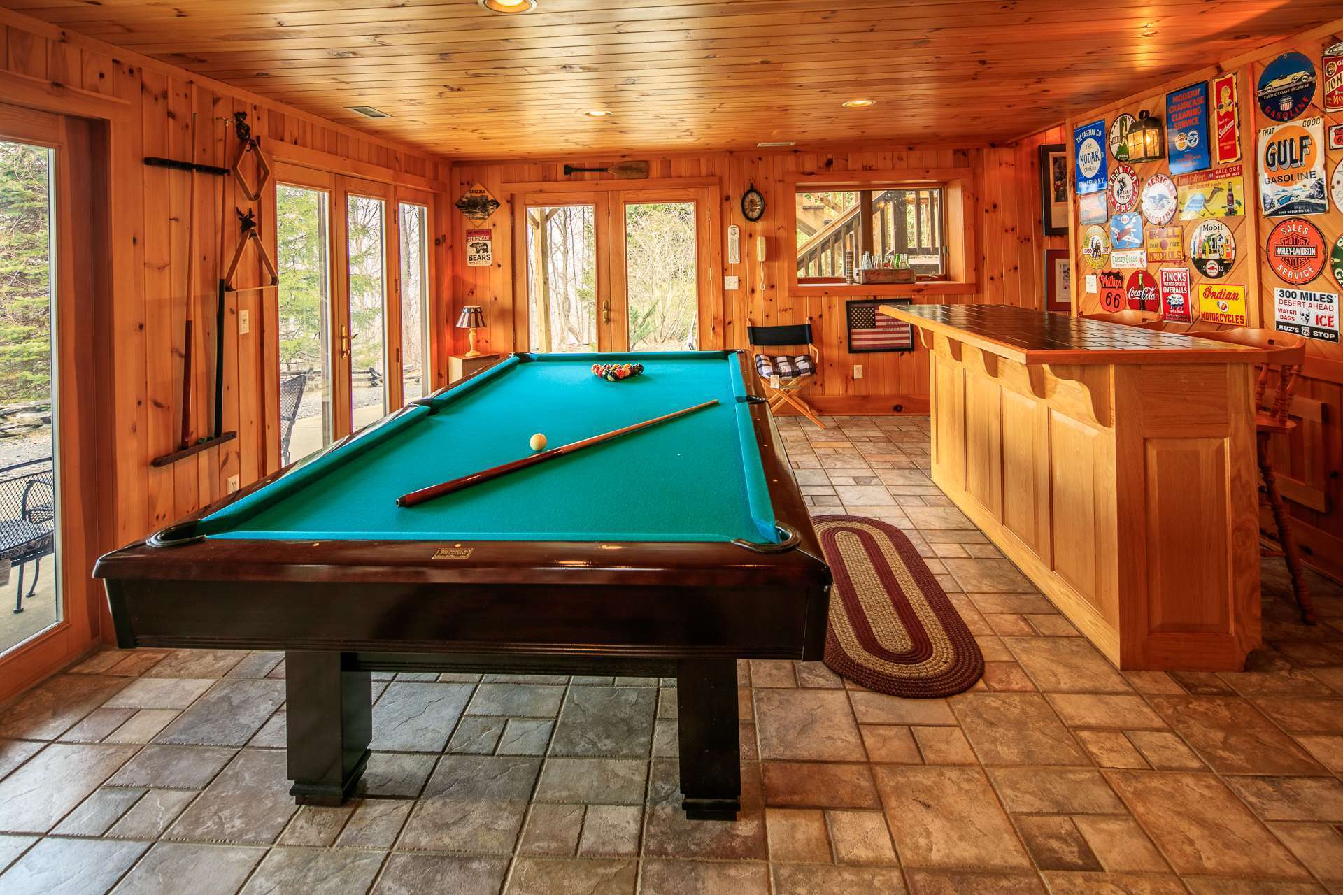 Complete with a bar area, this space is great for entertaining and the ultimate "Man Cave."