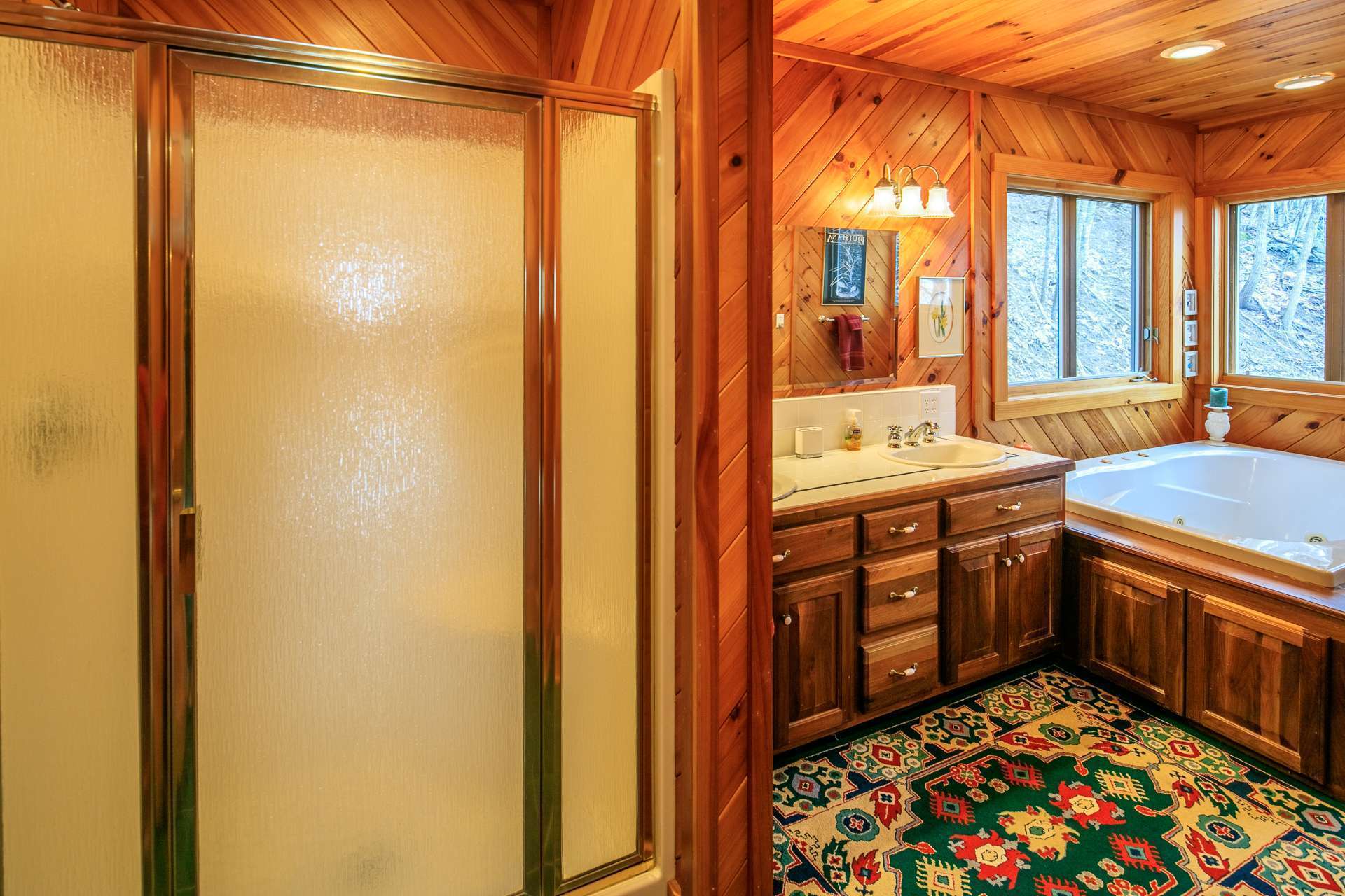 After a fun filled day of mountain activities, enjoy  a spa like experience  in the master bath  with double vanity, jetted tub, and separate shower.