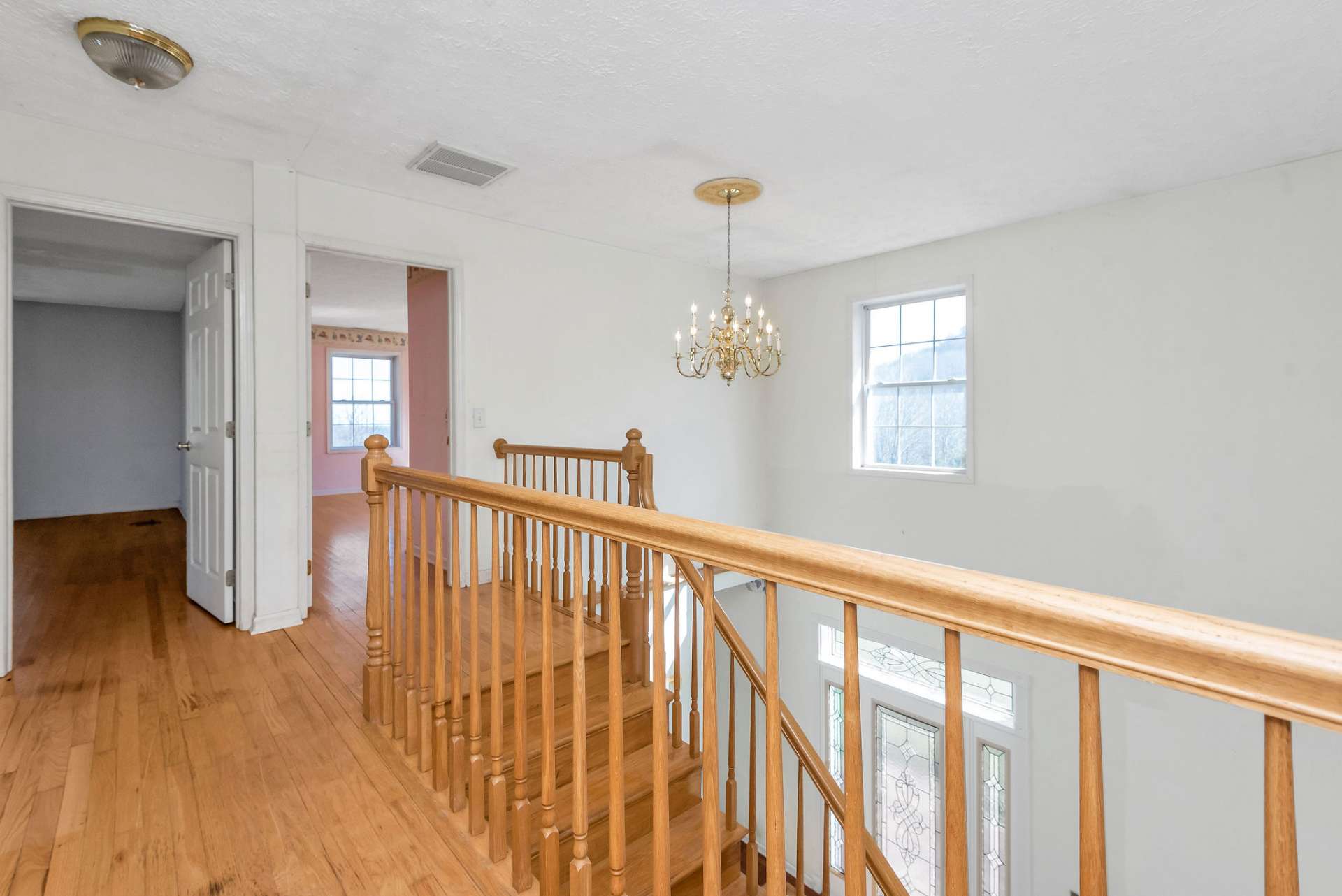 Upper level starts with 2 bedrooms to the right as you ascend the top of the stairs.